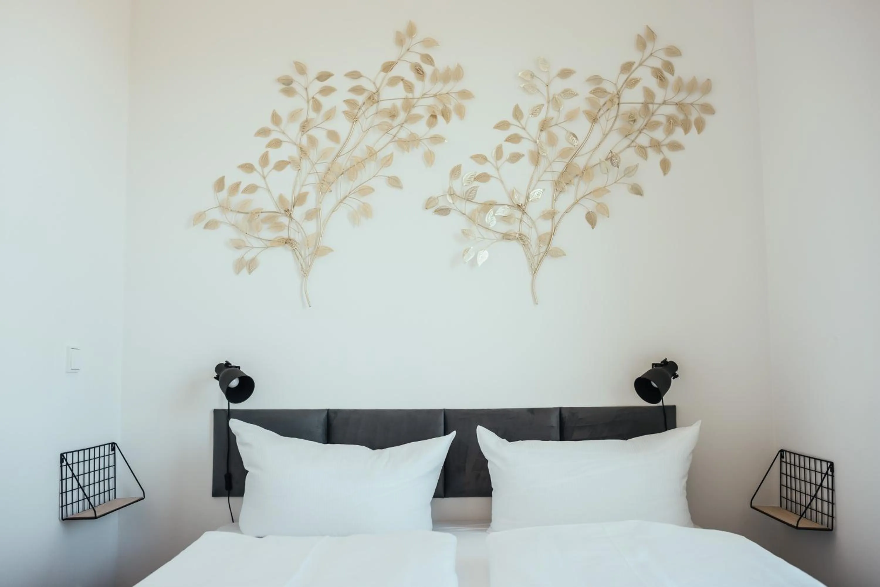 Bed in The Rix Studios & Suites