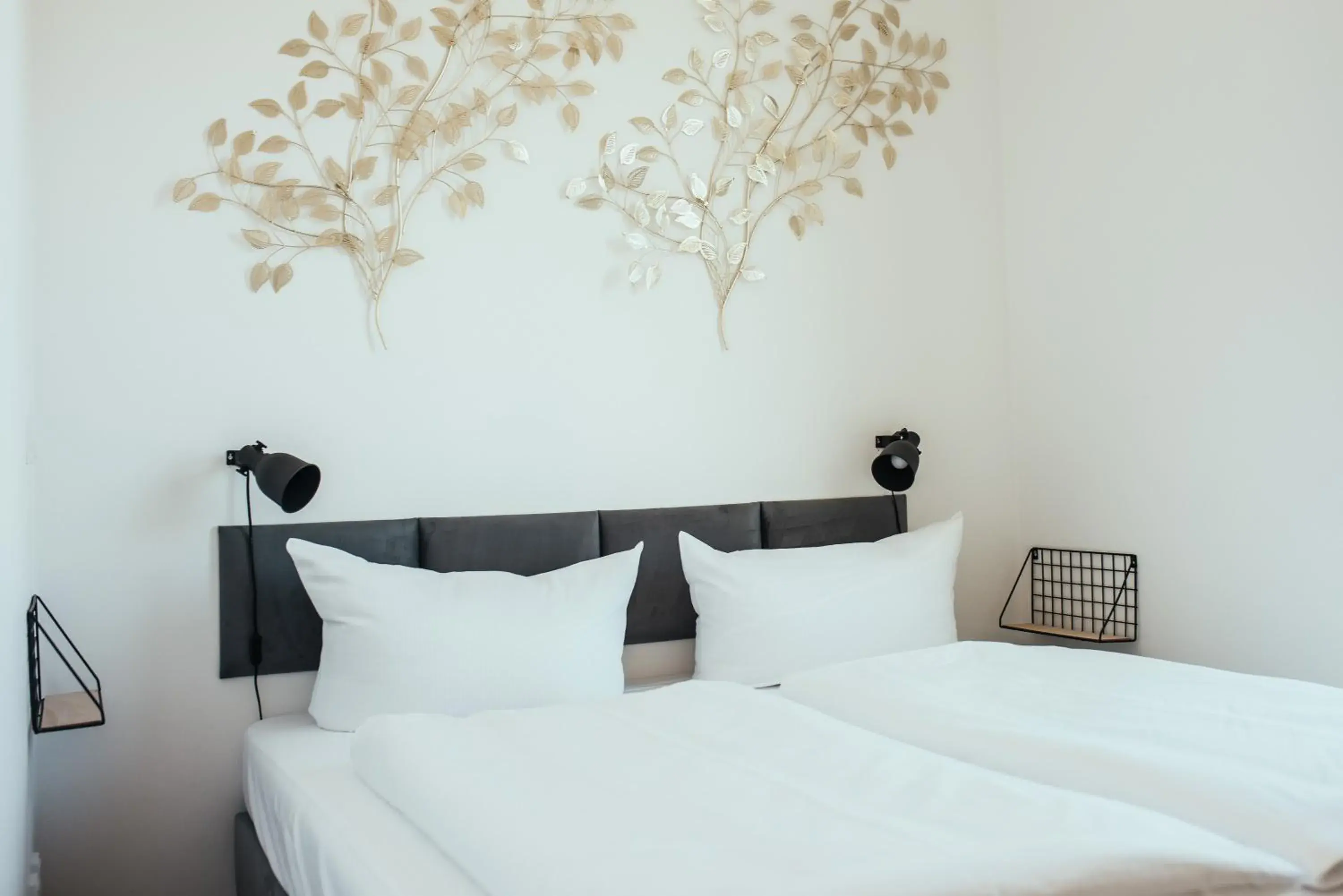 Bed in The Rix Studios & Suites Bed in The Rix Studios & Suites