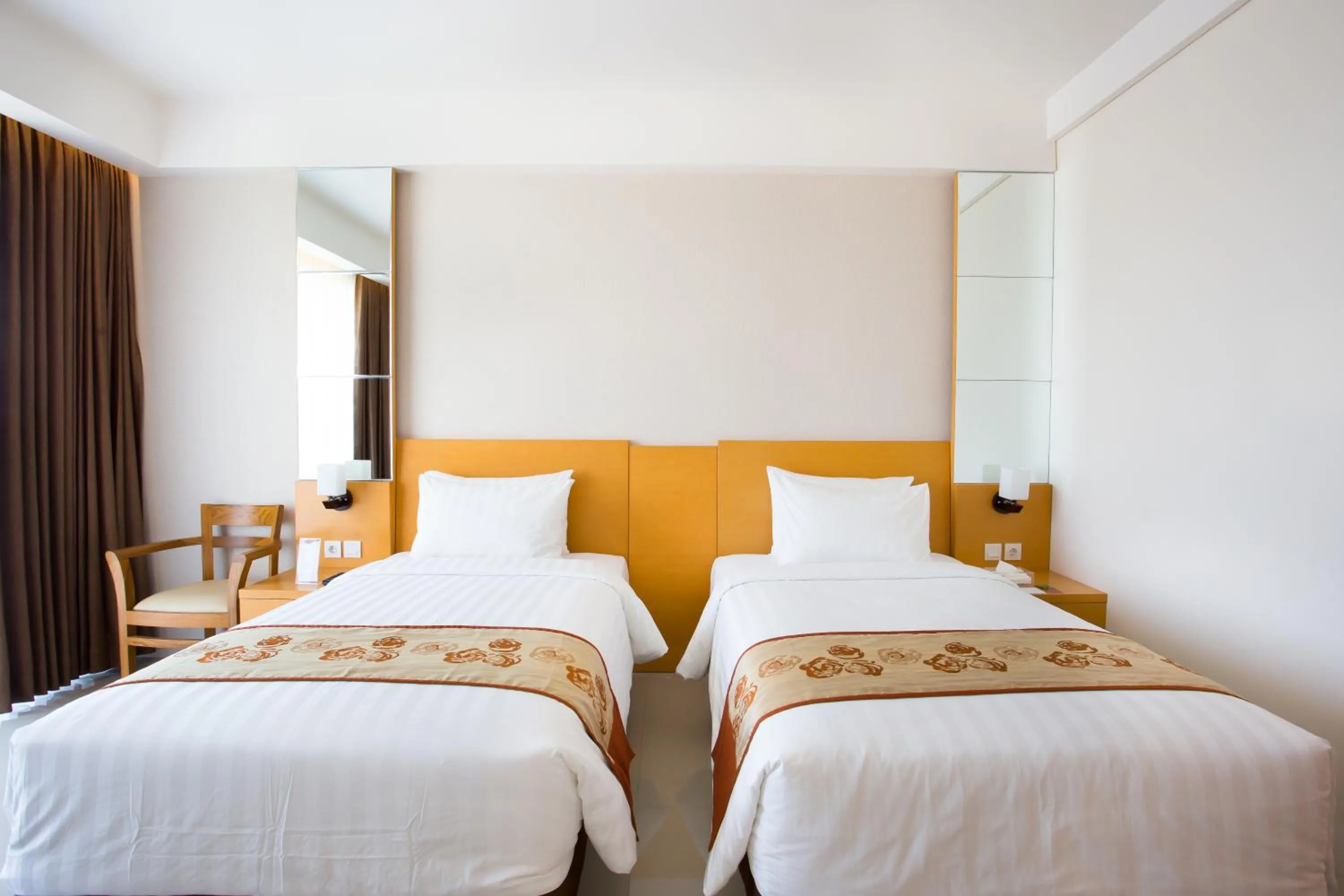 Bed in Golden Palace Hotel Lombok