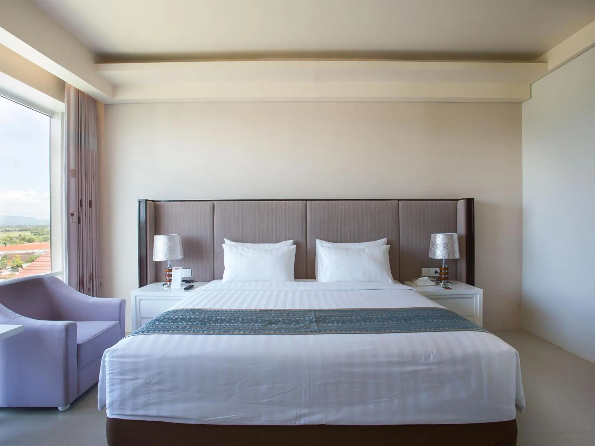 Bed in Golden Palace Hotel Lombok