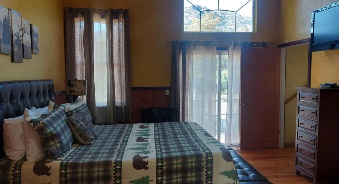 Photo of the whole room, Bed in Sequoia River Front Cabins