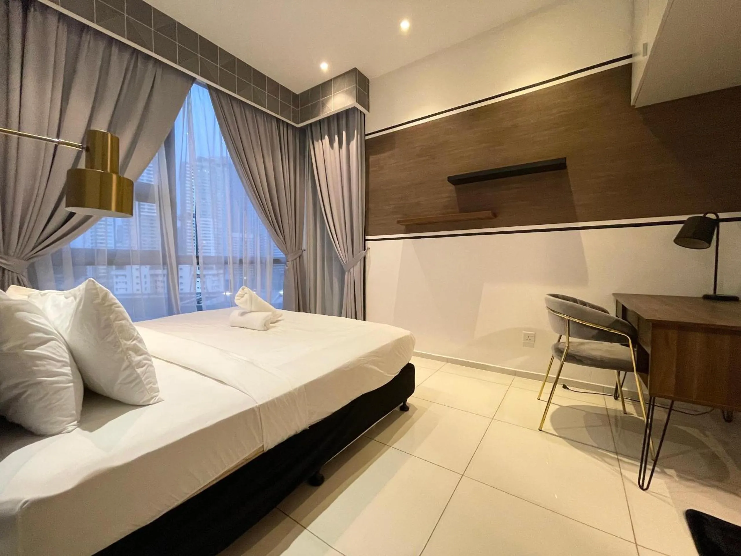 Bed in The Robertson-Bukit Bintang by PILLOWTALKS