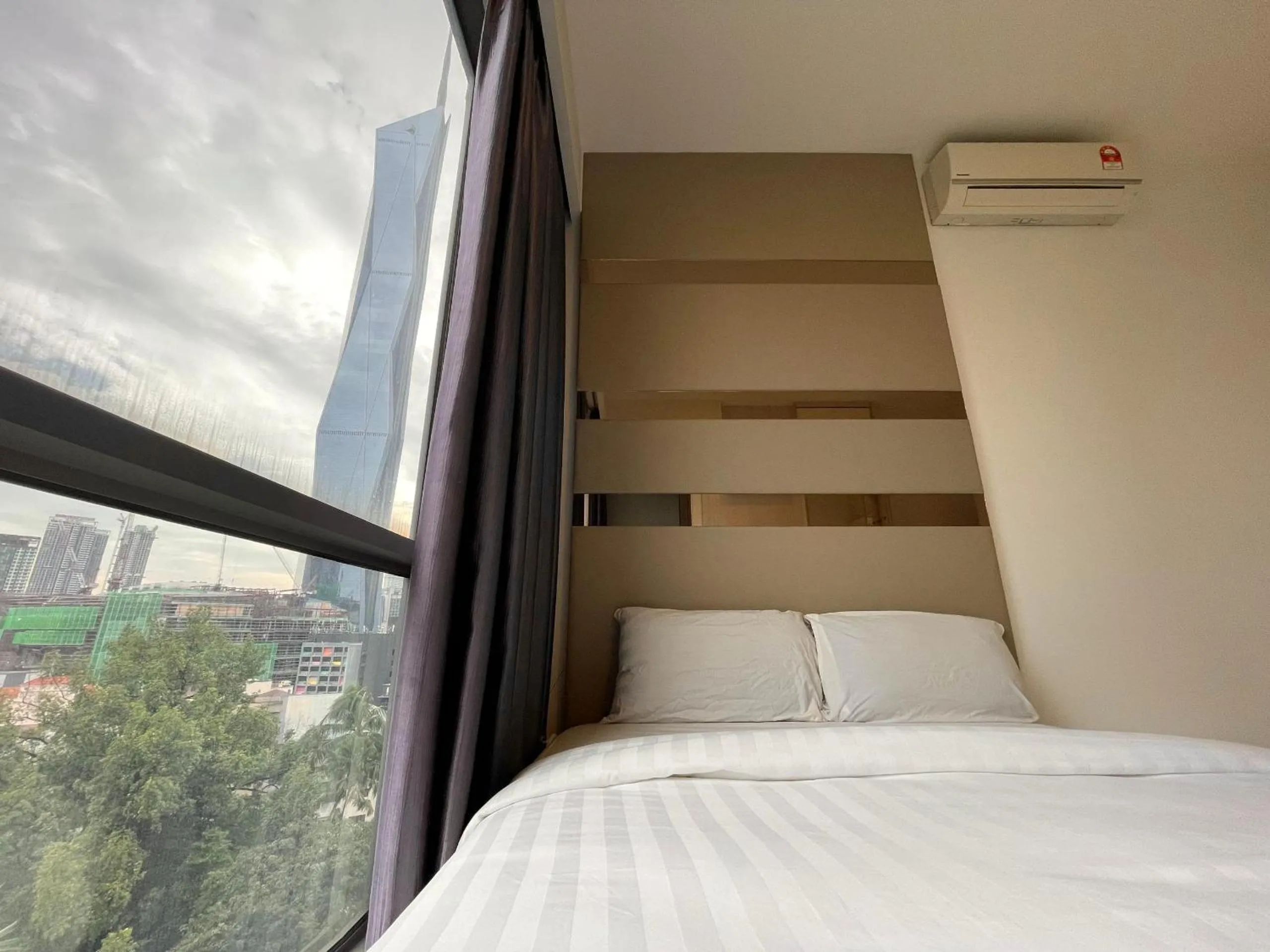 Bed in The Robertson-Bukit Bintang by PILLOWTALKS