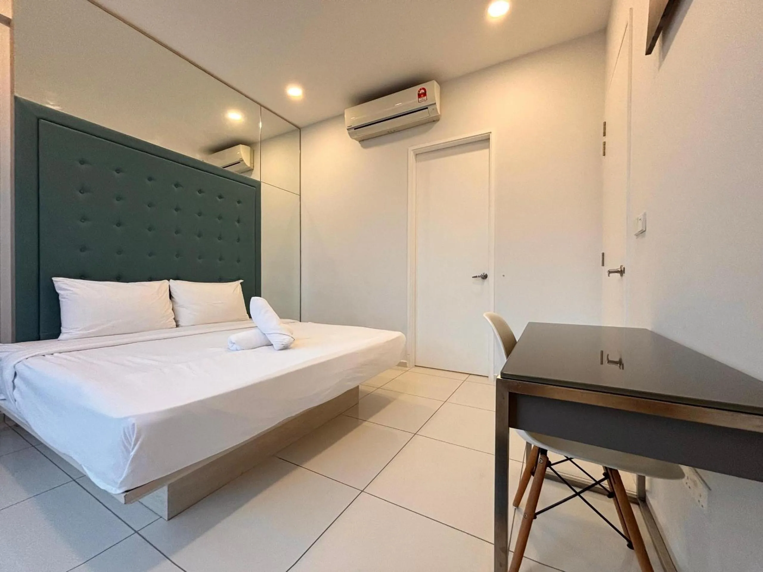 Bed in The Robertson-Bukit Bintang by PILLOWTALKS