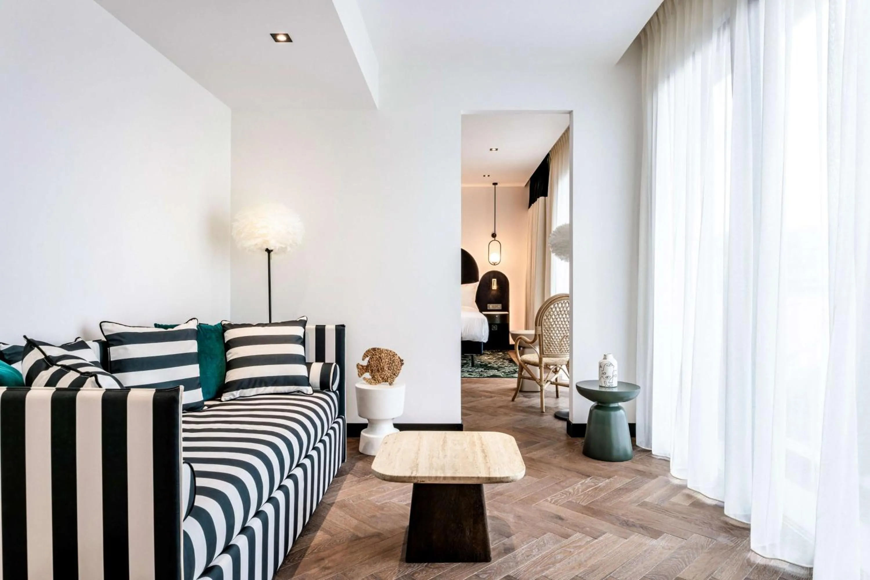 Living room, Bed in Doubletree By Hilton Nice Centre Iconic