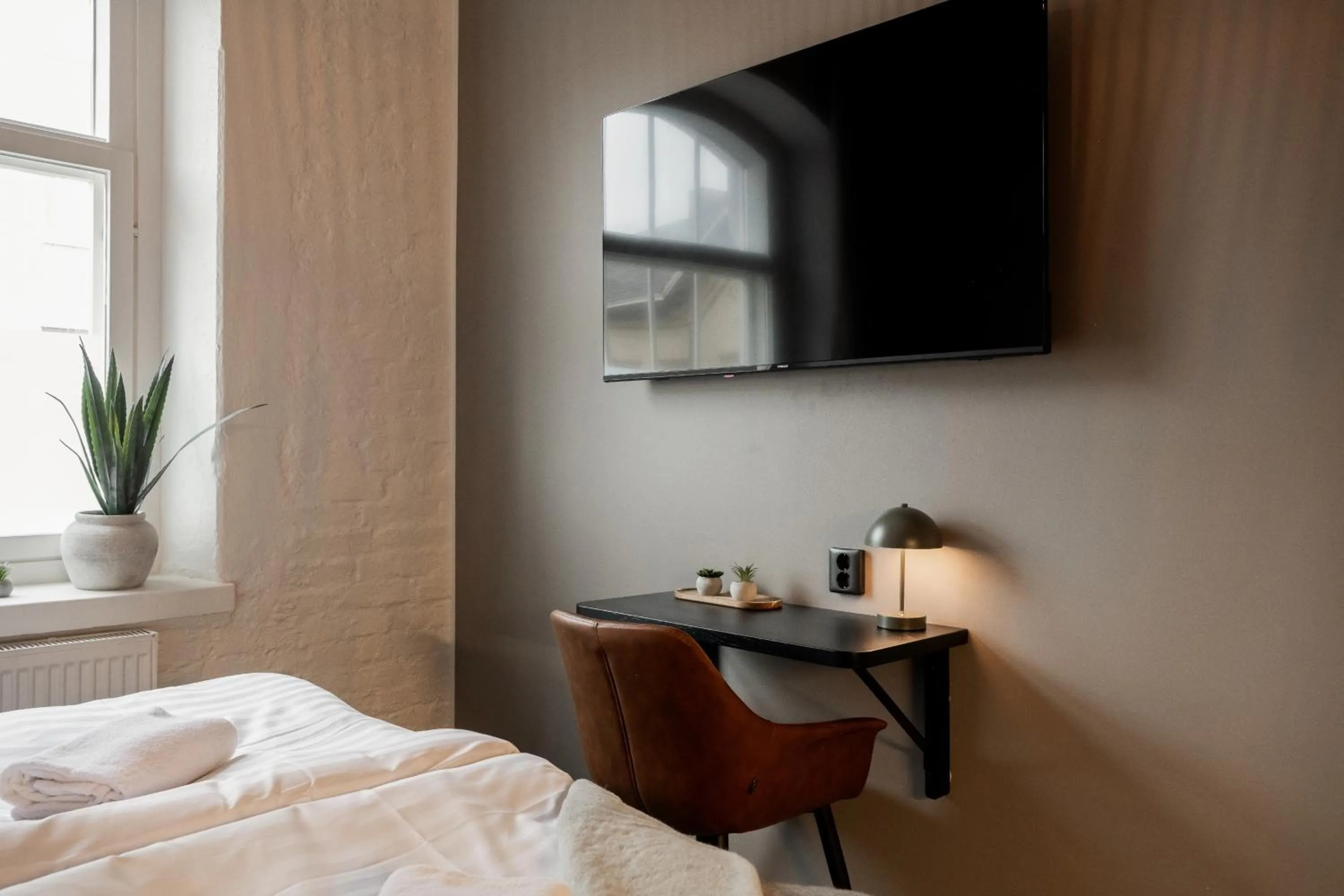 Bed in Frans & Frans - Hotel and Apartments by UHANDA