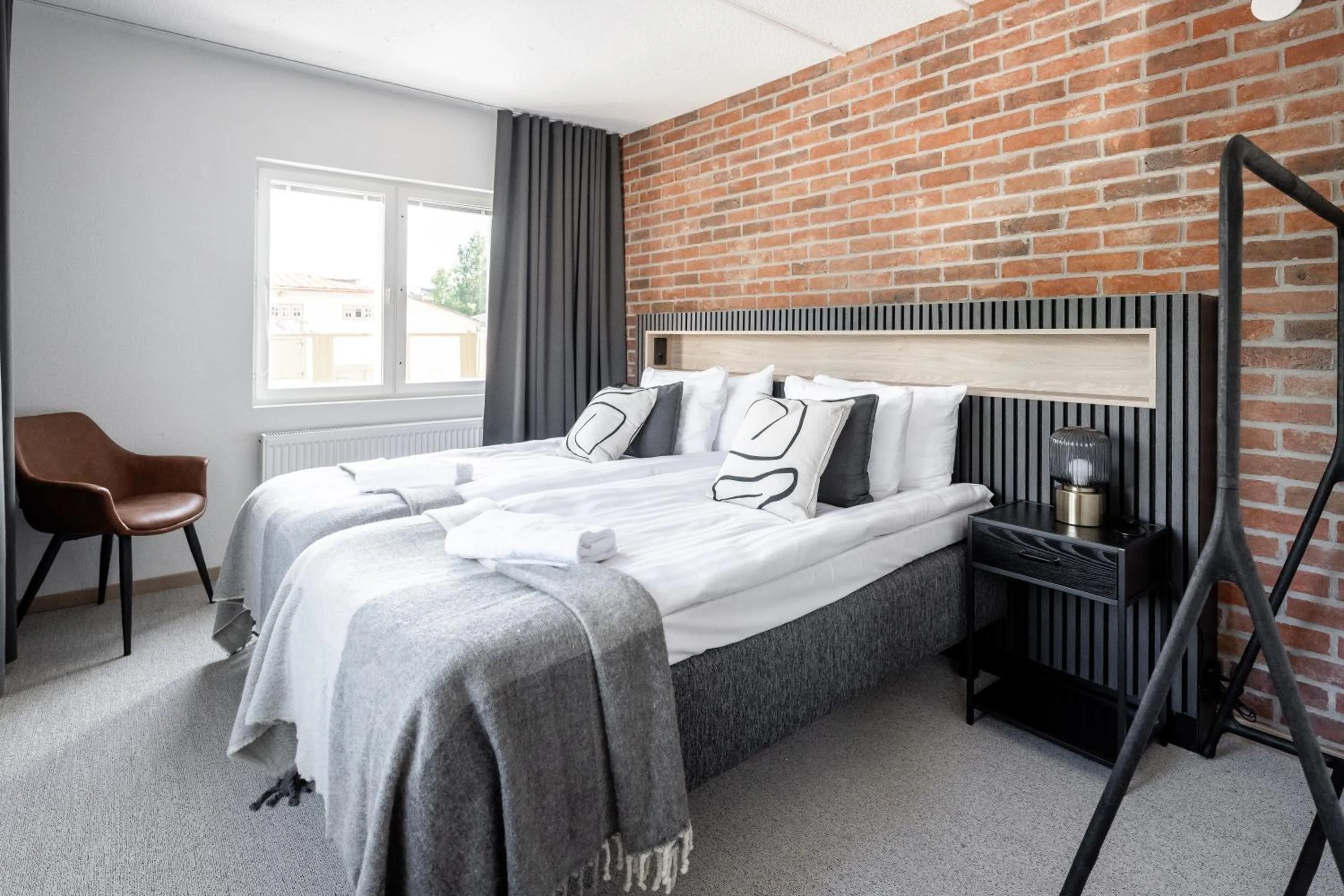 Bed in Frans & Frans - Hotel and Apartments by UHANDA