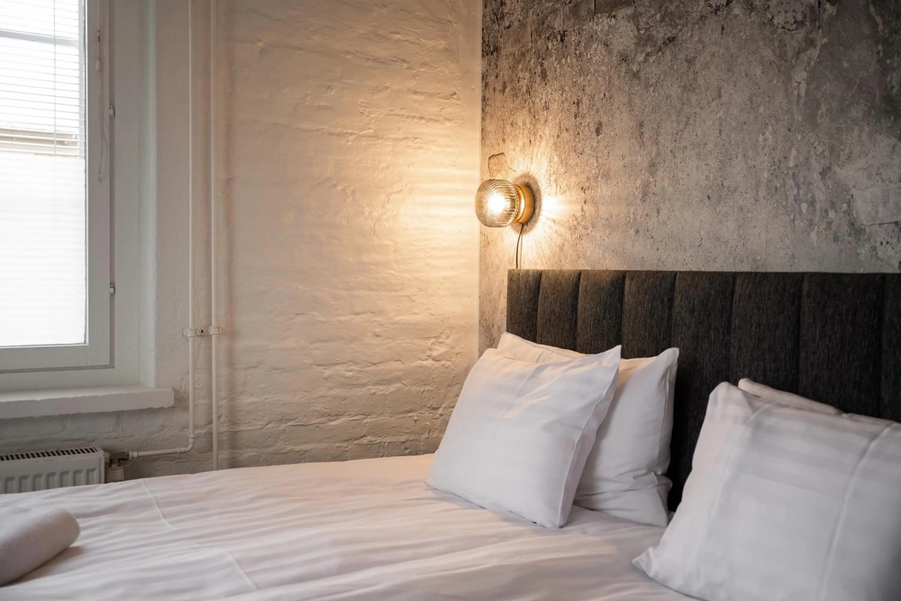 Bed in Frans & Frans - Hotel and Apartments by UHANDA