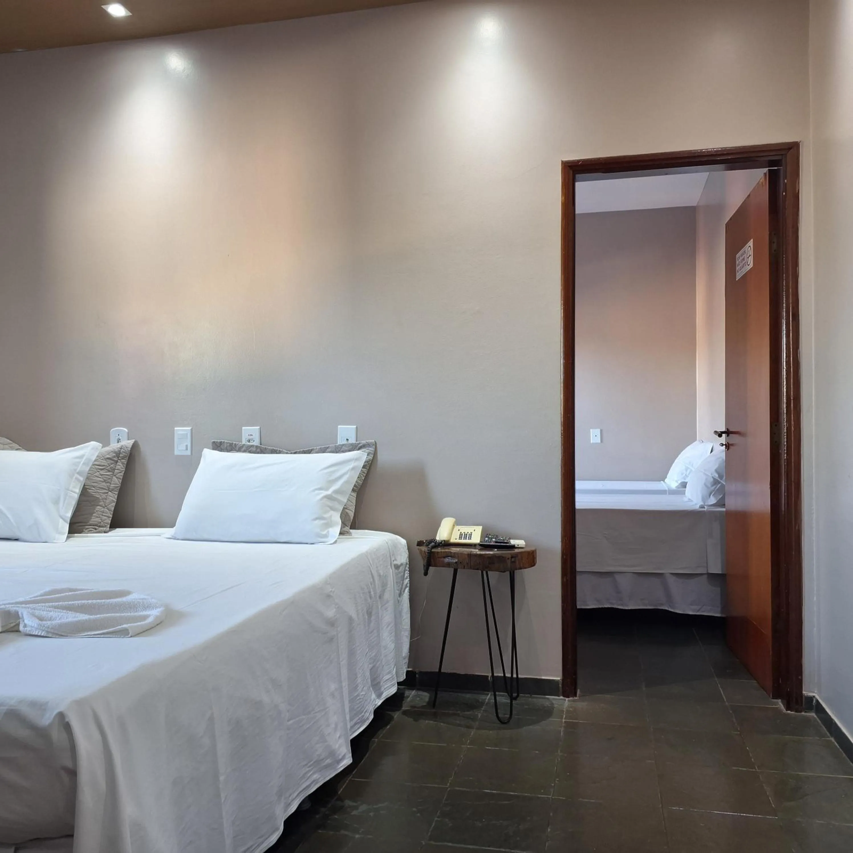 Bed in Pousada Sol do Araguaia