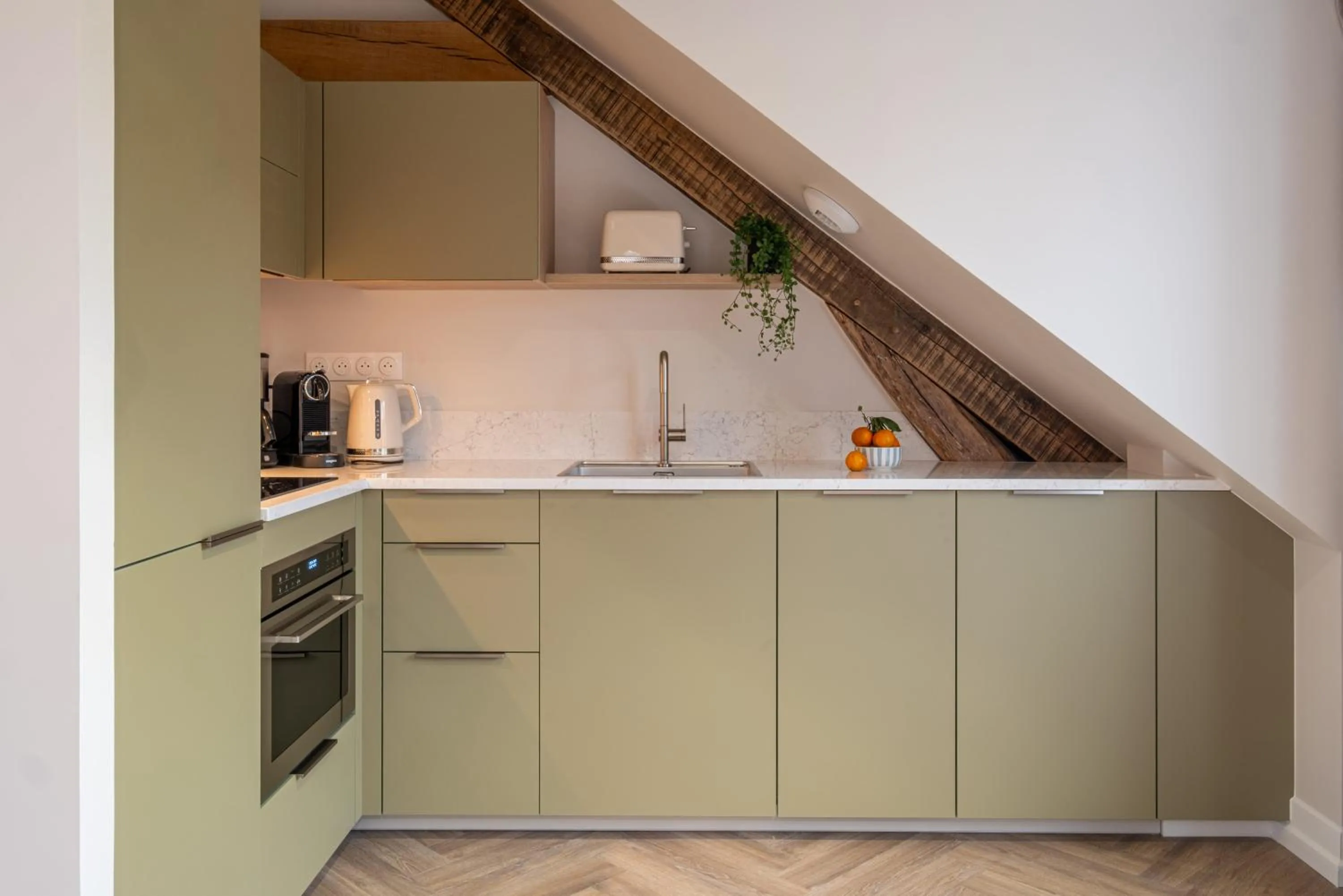 Kitchen or kitchenette in L'Horloge - Appart'Hotel proche de Disneyland