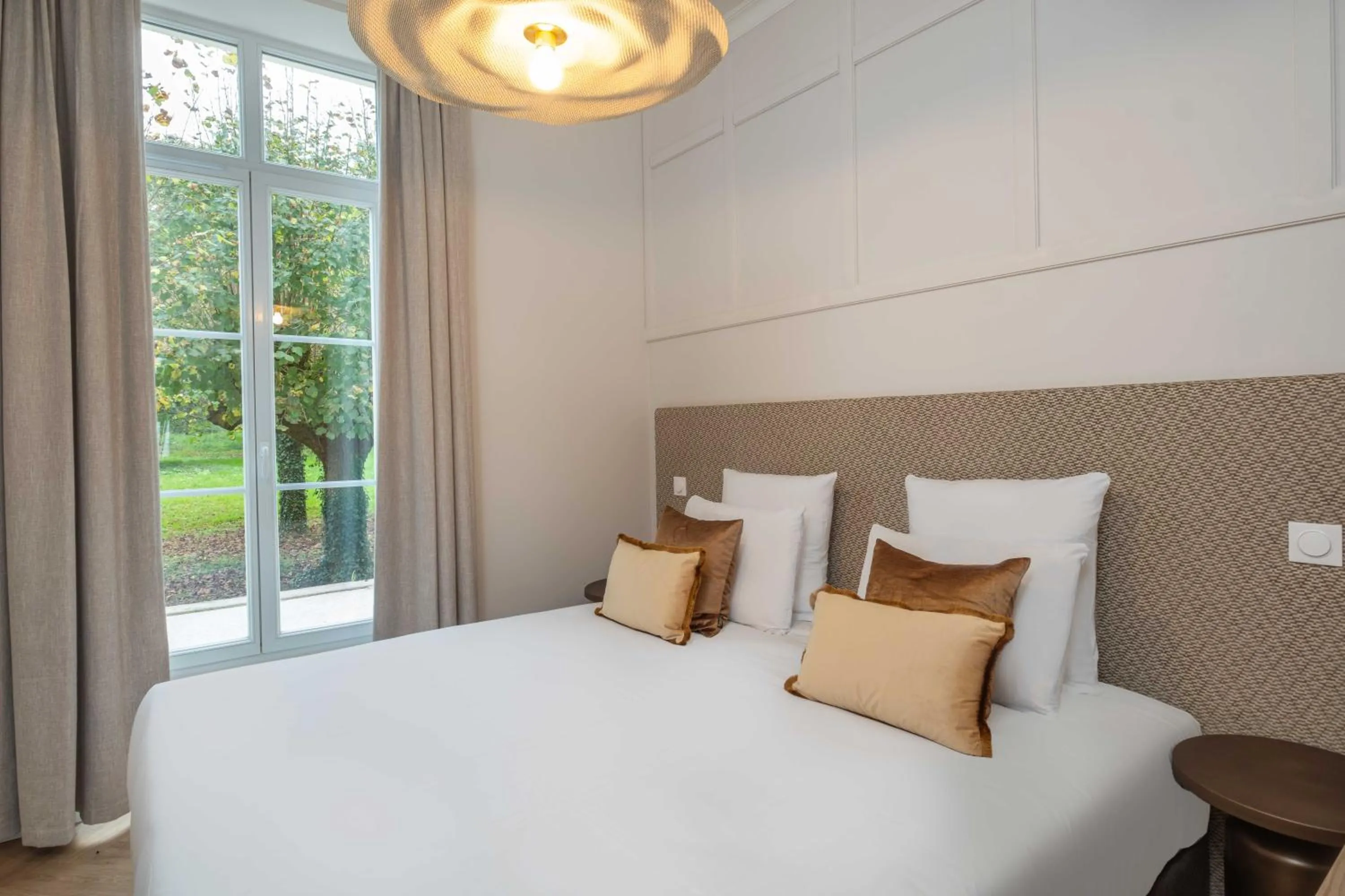 Bedroom, Bed in L'Horloge - Appart'Hotel proche de Disneyland