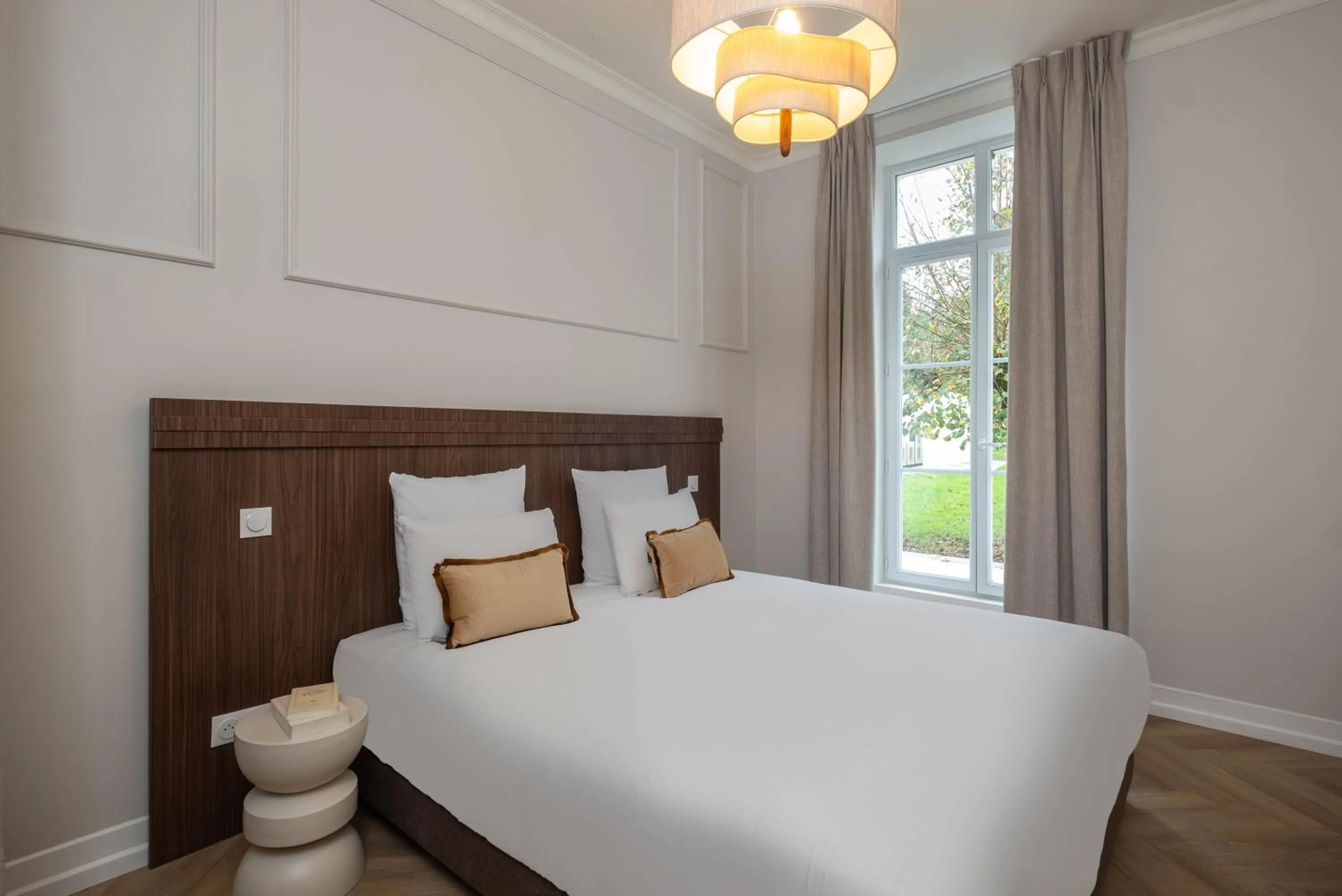 Bedroom, Bed in L'Horloge - Appart'Hotel proche de Disneyland