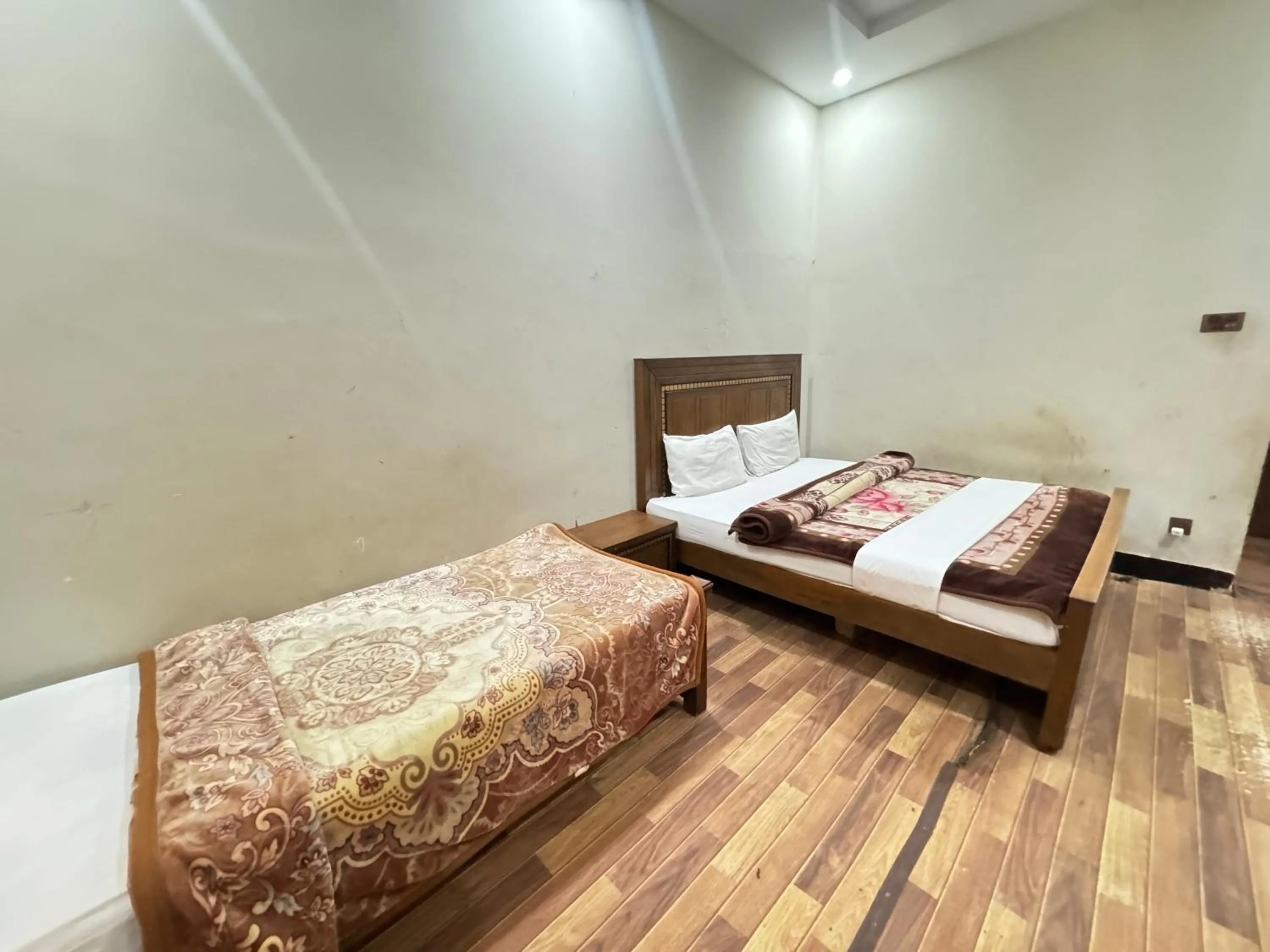 Bed in Millat Guest House G9
