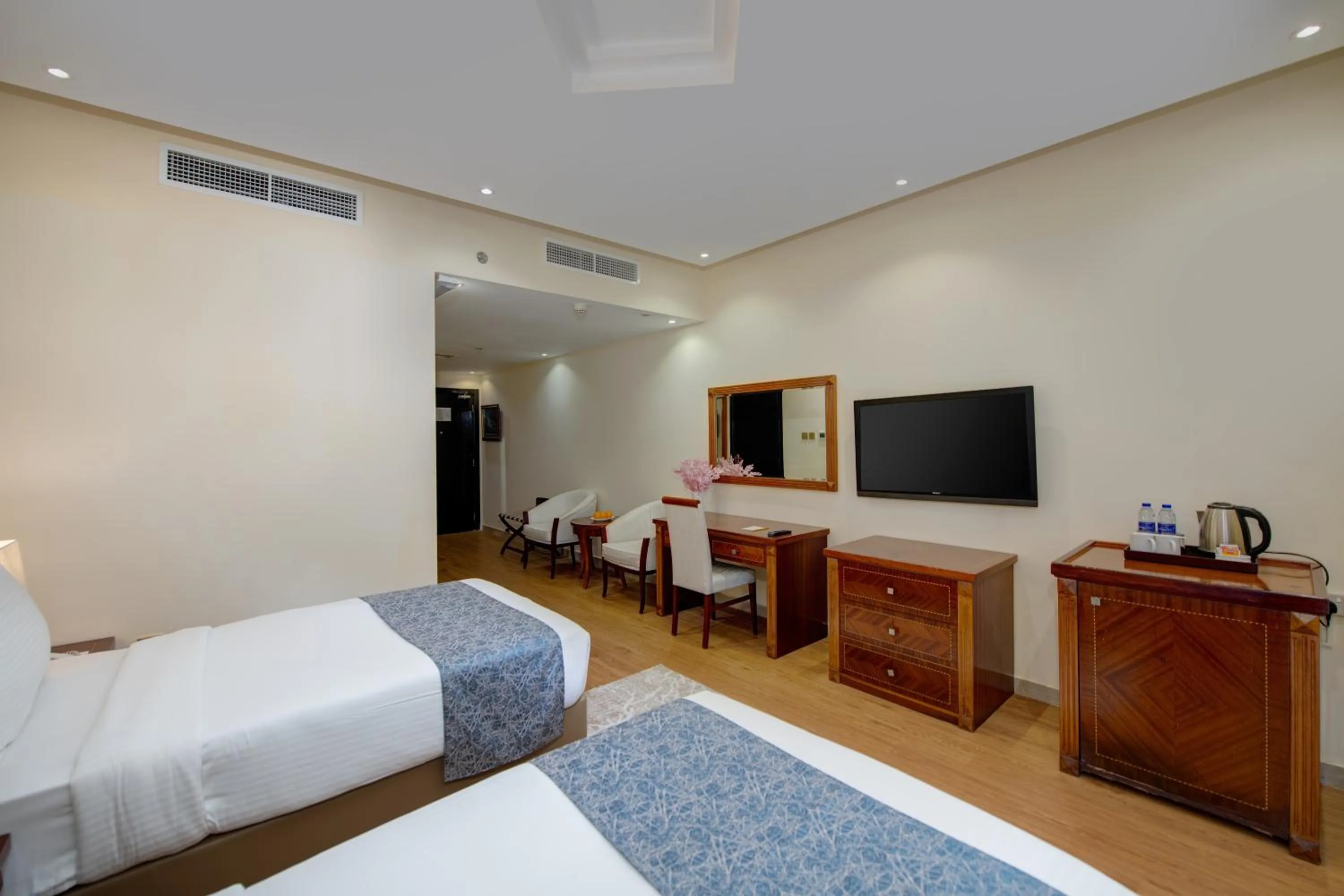 Bed in Vendome Plaza Hotel