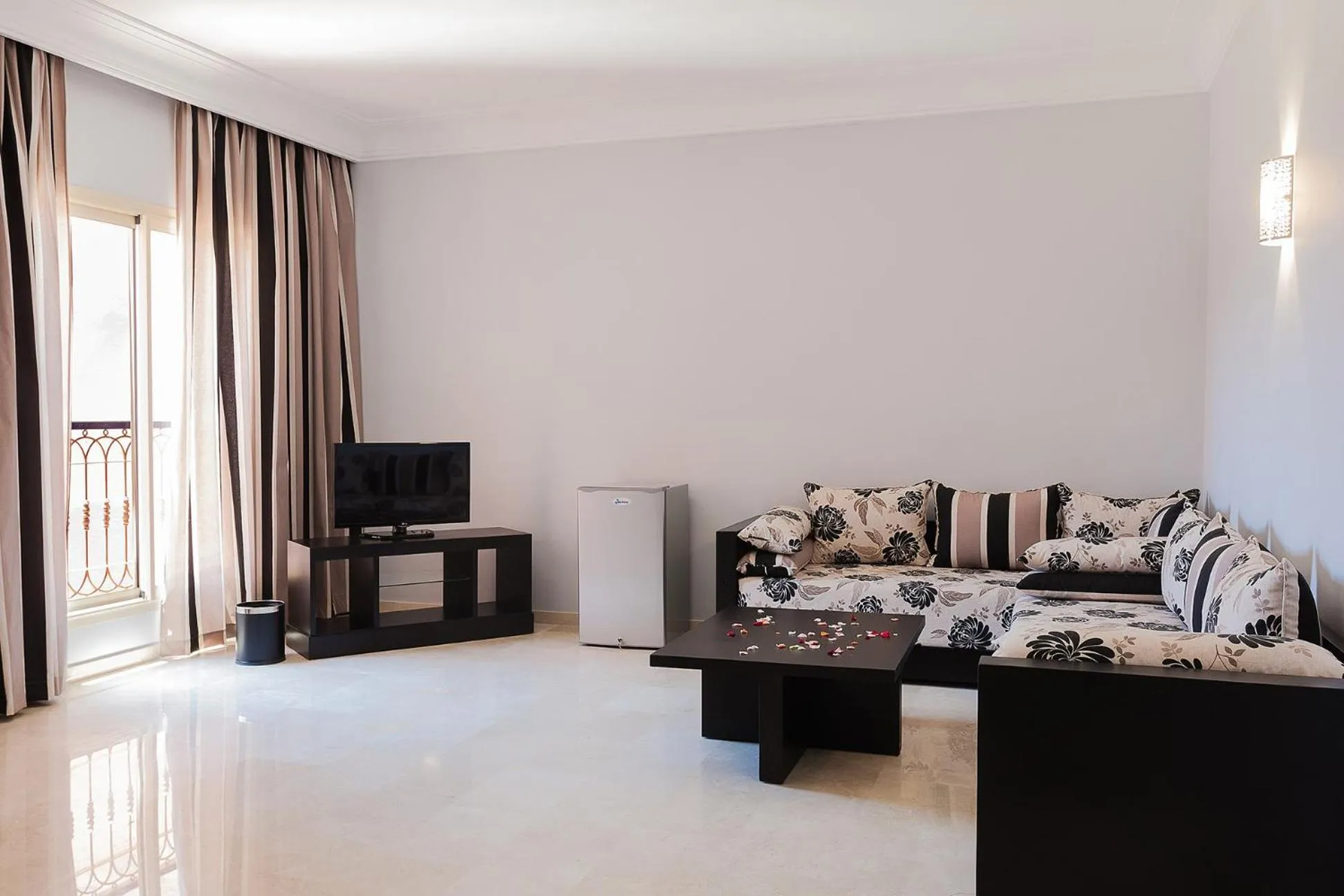 Communal lounge/ TV room in Palm Appart Hôtel Marrakech