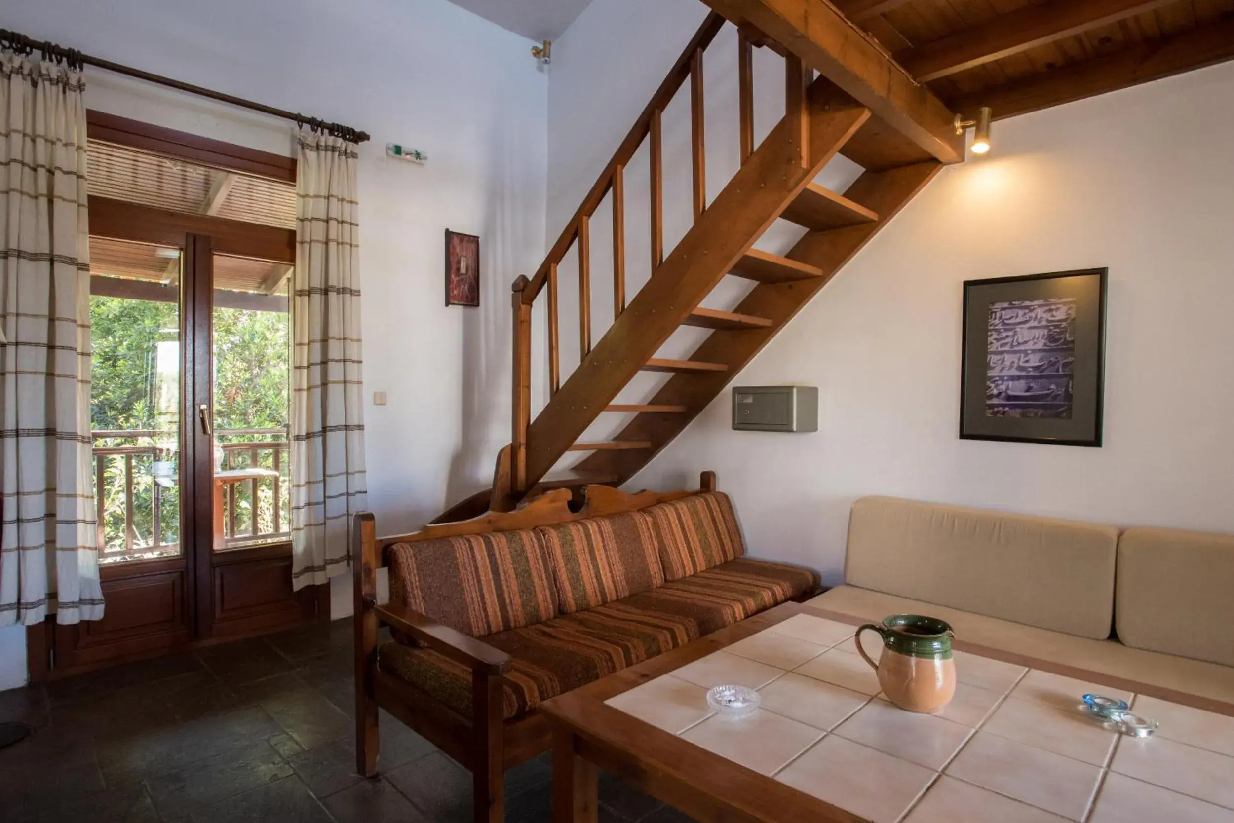 Living room in Proimos Maisonnettes Living room in Proimos Maisonnettes