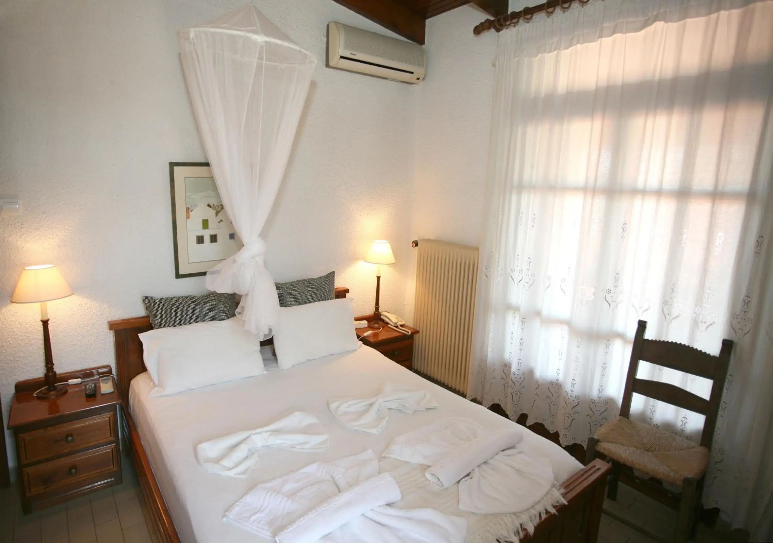 Bedroom, Bed in Proimos Maisonnettes Bedroom, Bed in Proimos Maisonnettes