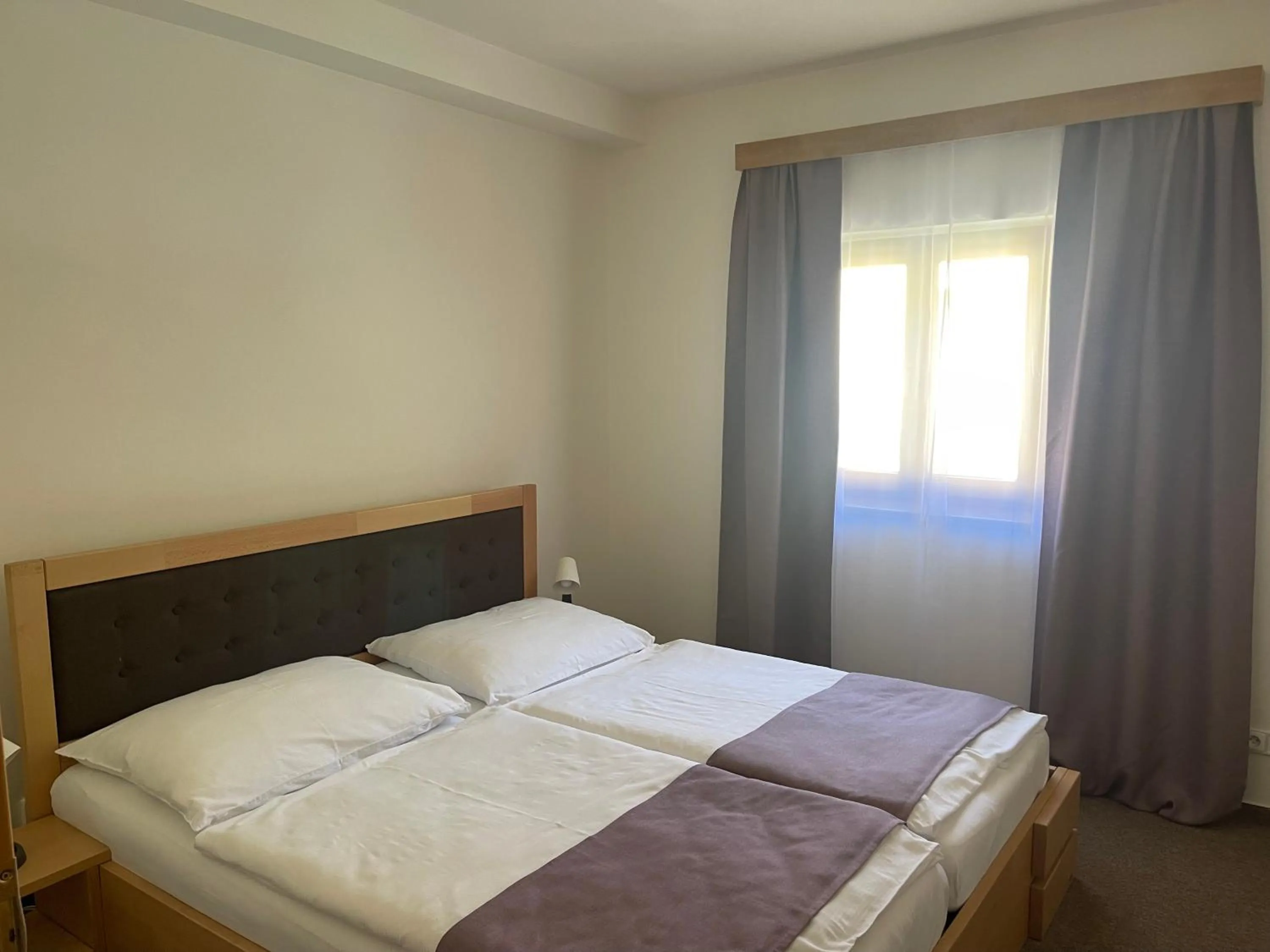 Bed in Amantis Vital Sport Hotel