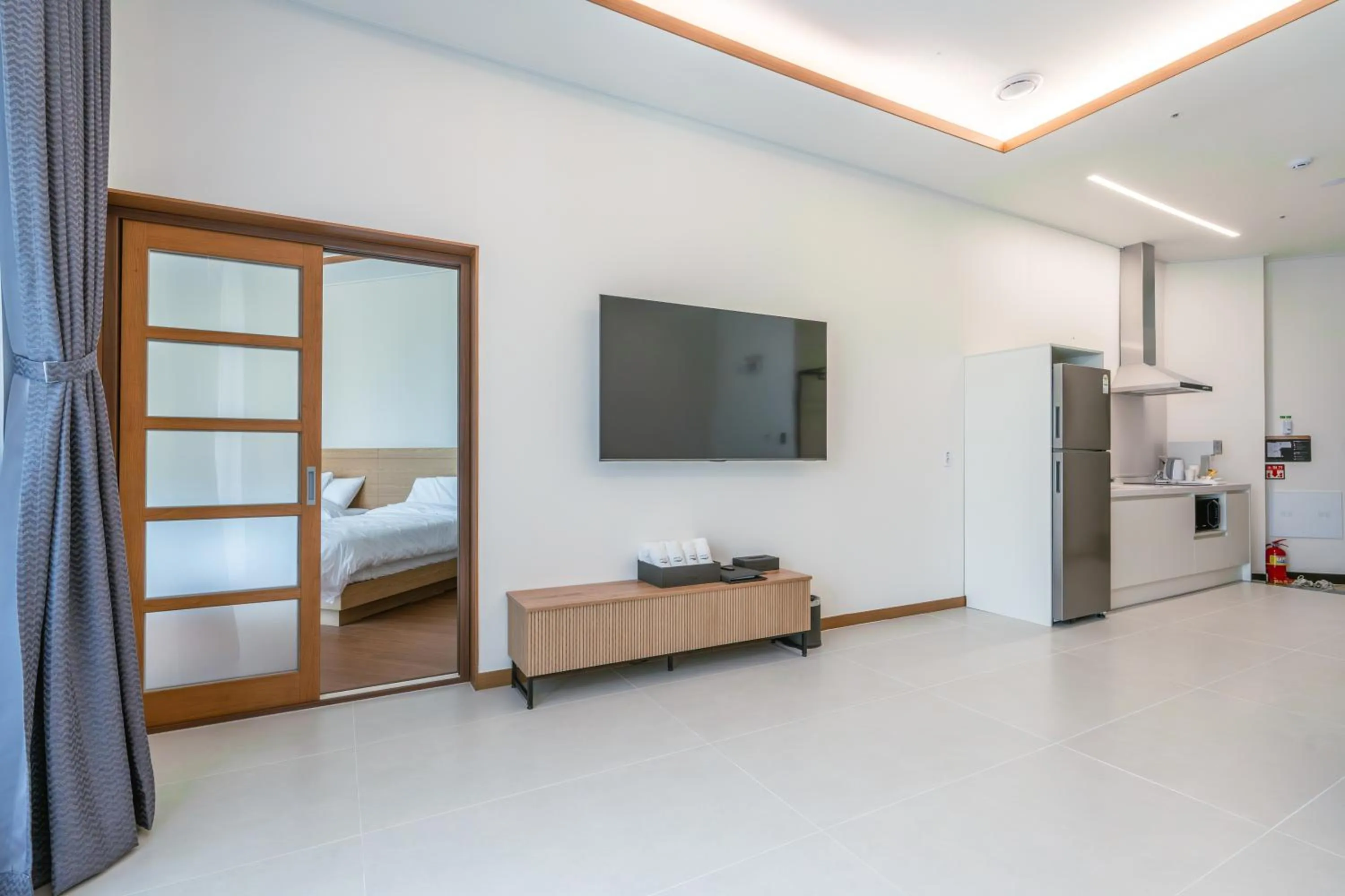 Bed in Dongho Beach Hotel