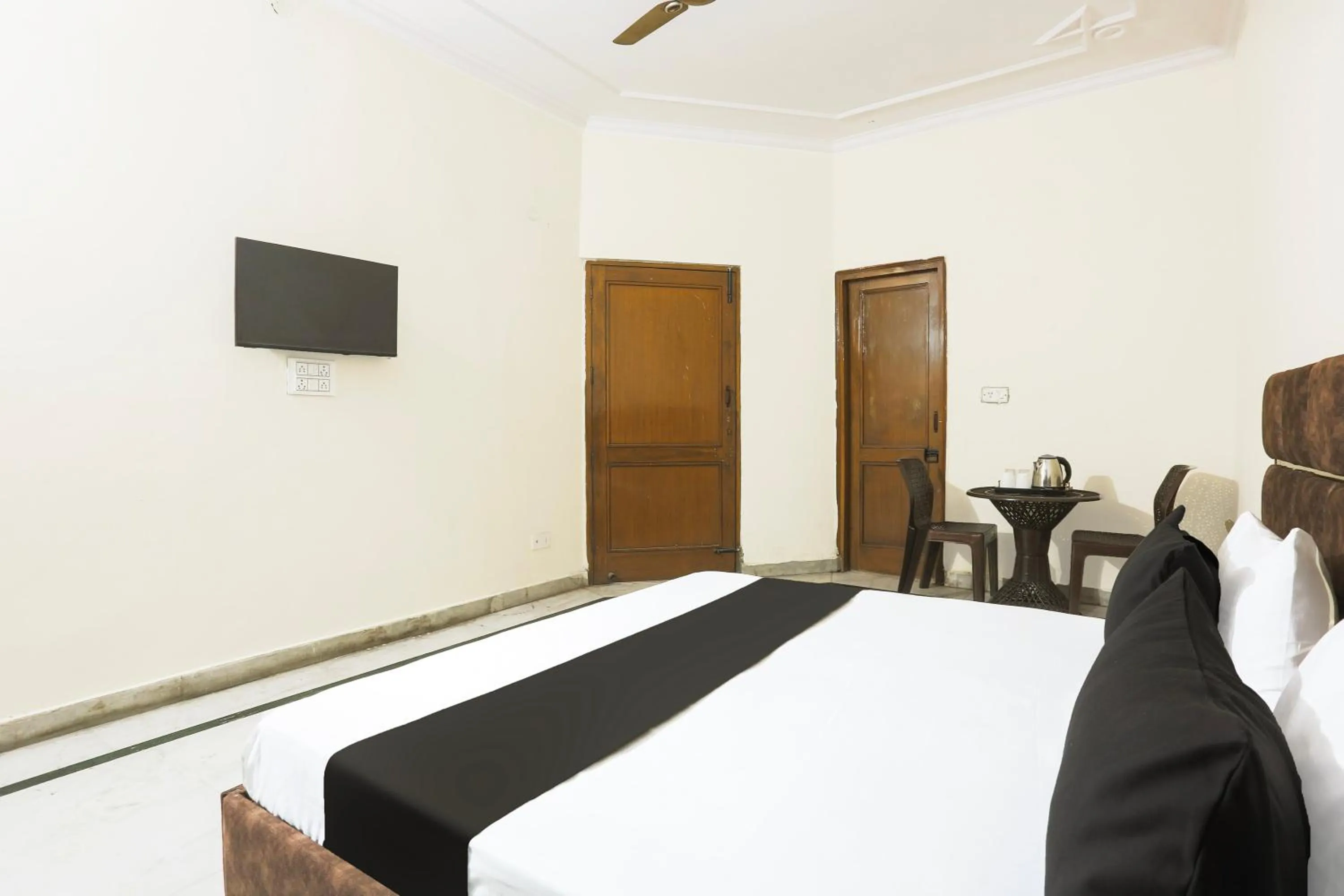 Bedroom in Hotel O JPS DC RESIDENCY