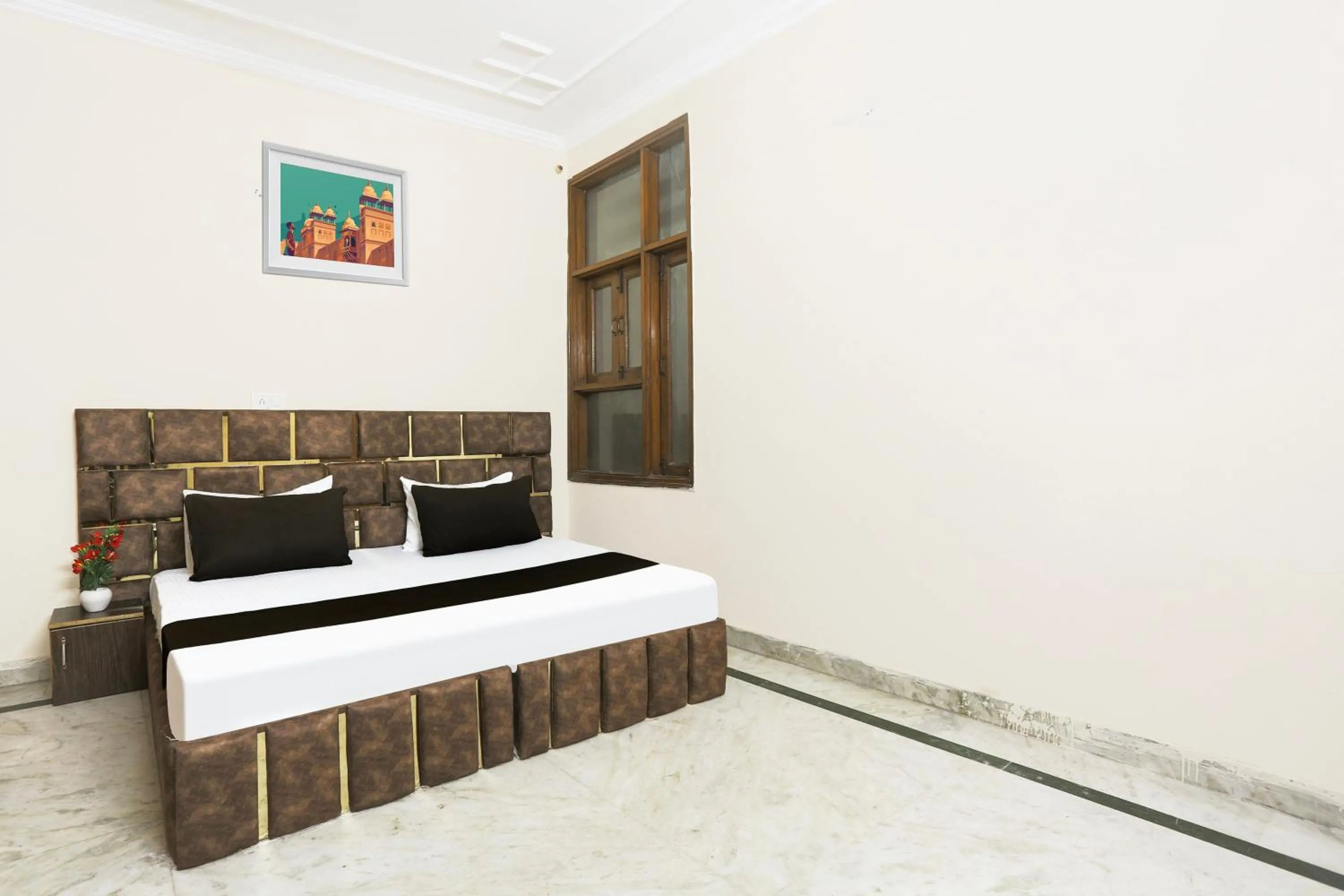 Bedroom in Hotel O JPS DC RESIDENCY