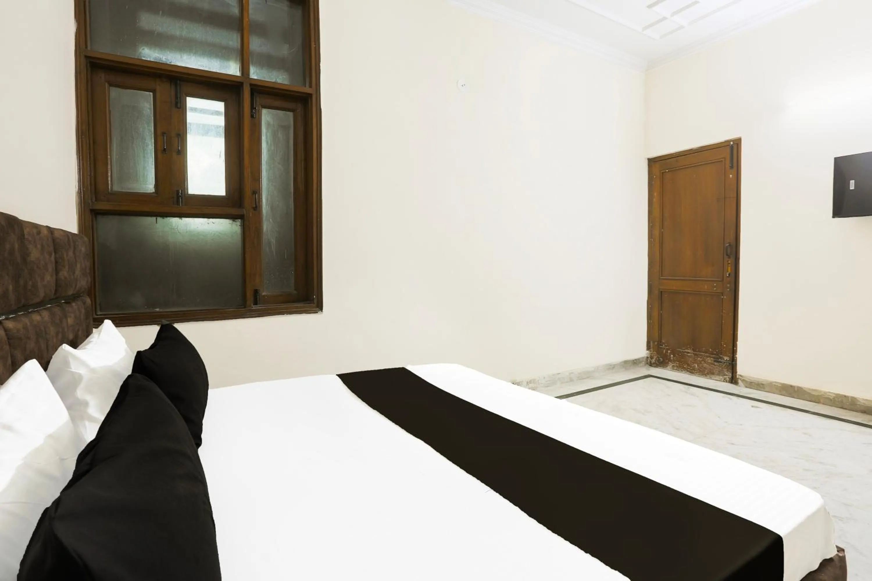 Bedroom in Hotel O JPS DC RESIDENCY