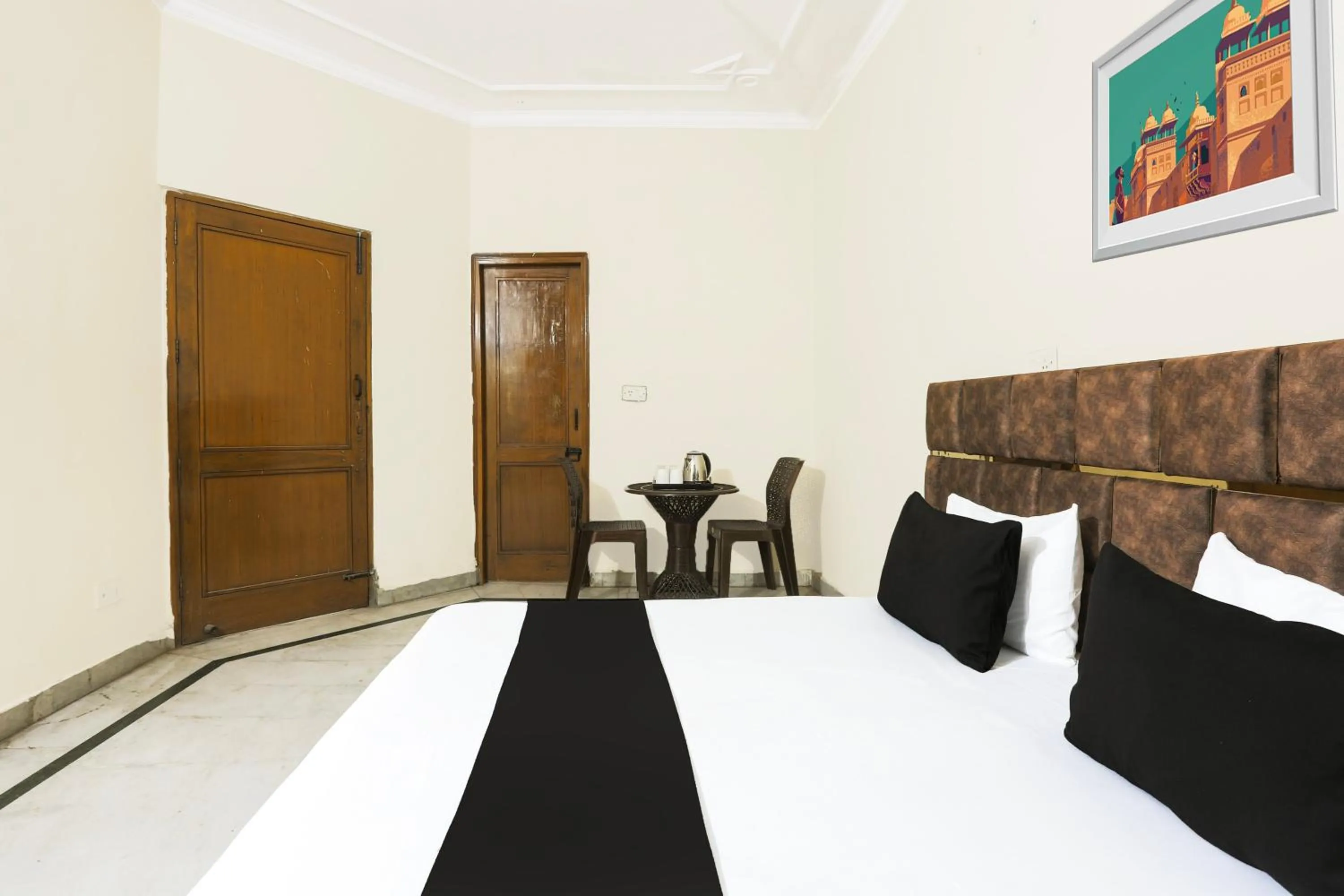 Bedroom in Hotel O JPS DC RESIDENCY