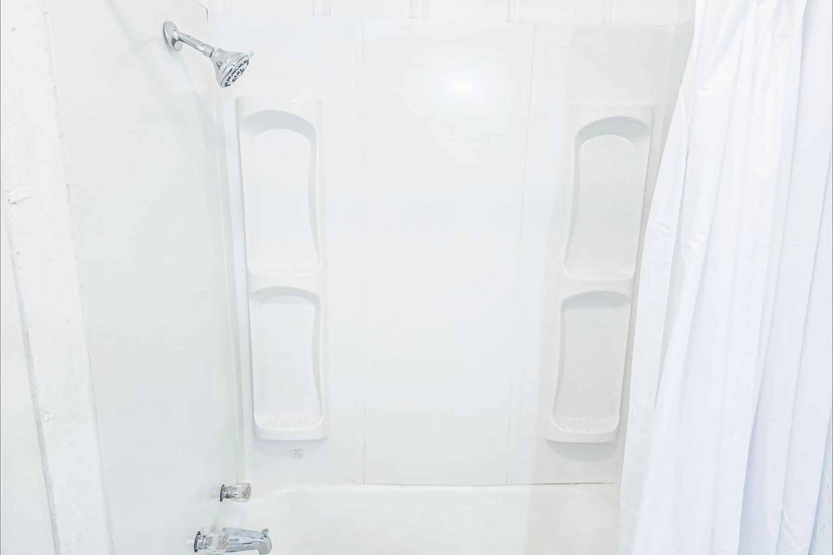 Bathroom in Budget Inn By OYO Palestine TX Hwy 79