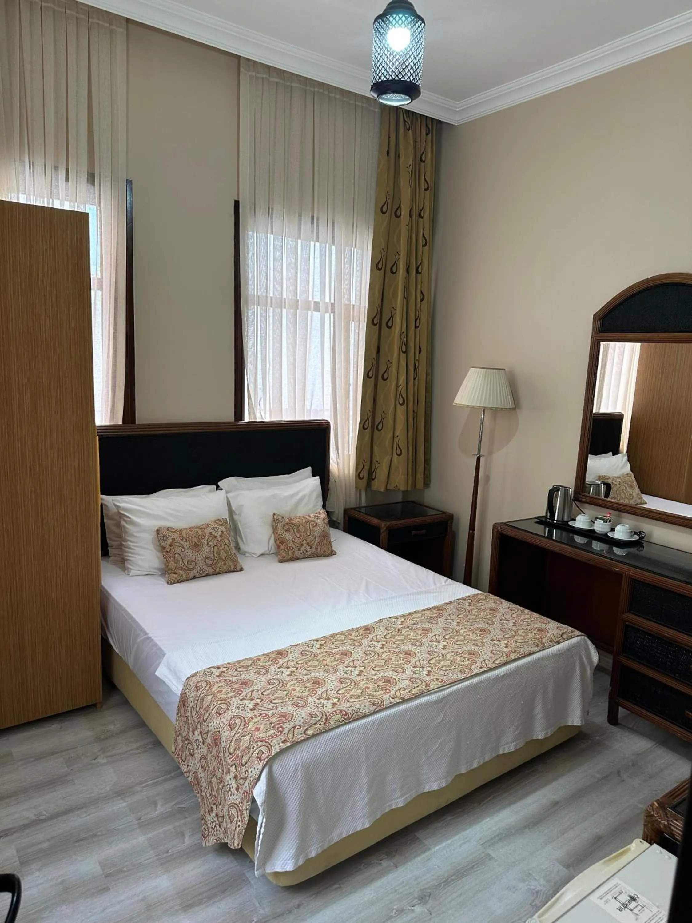 Bed in Loost Town Inn Hotel