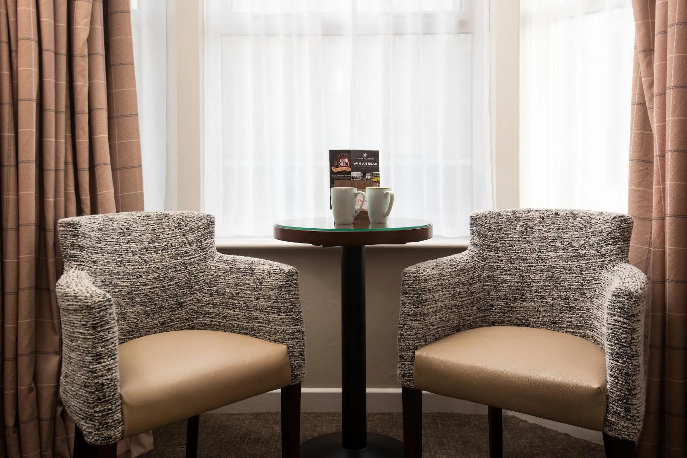 Seating area in Windermere Rooms at The Wateredge Inn