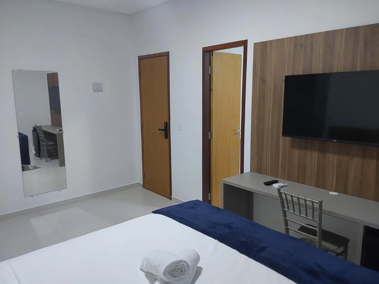 Bed in PARALELO 9s HOTEL