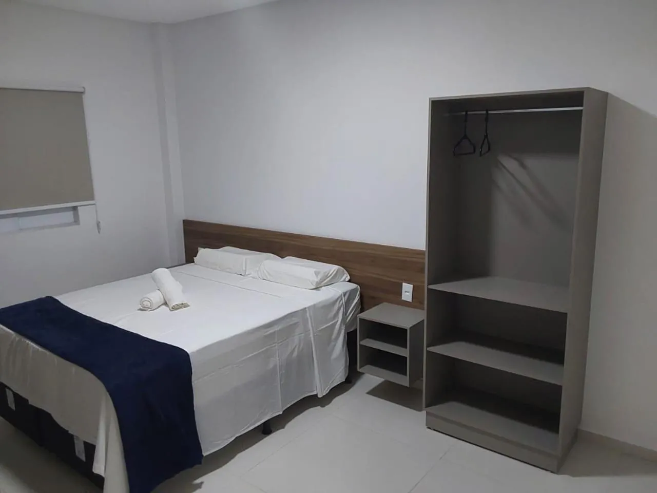 Bed in PARALELO 9s HOTEL