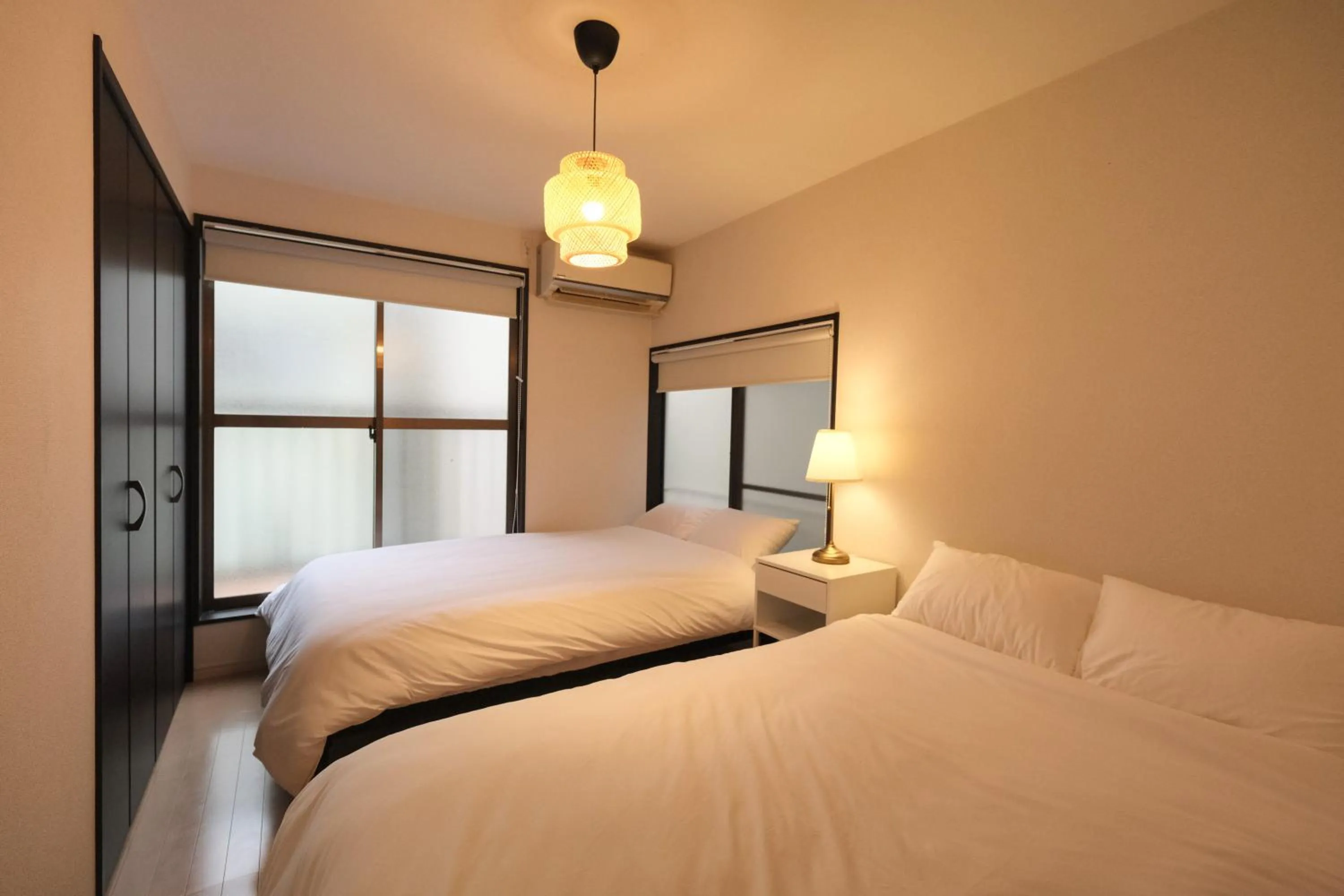 Bed in Urban House Nakano