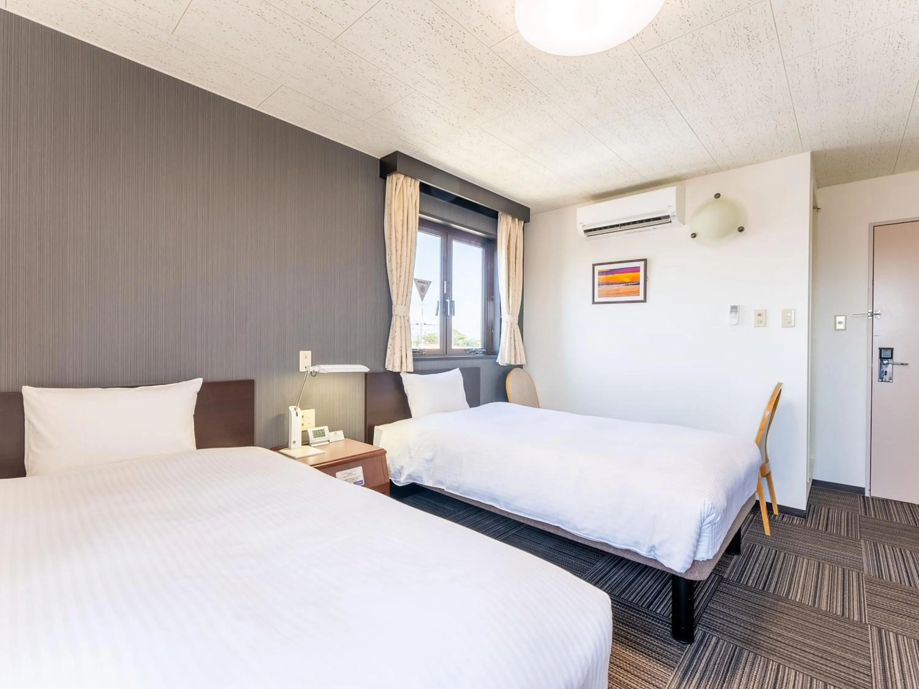 Bed in Noshiro Town Hotel Minami