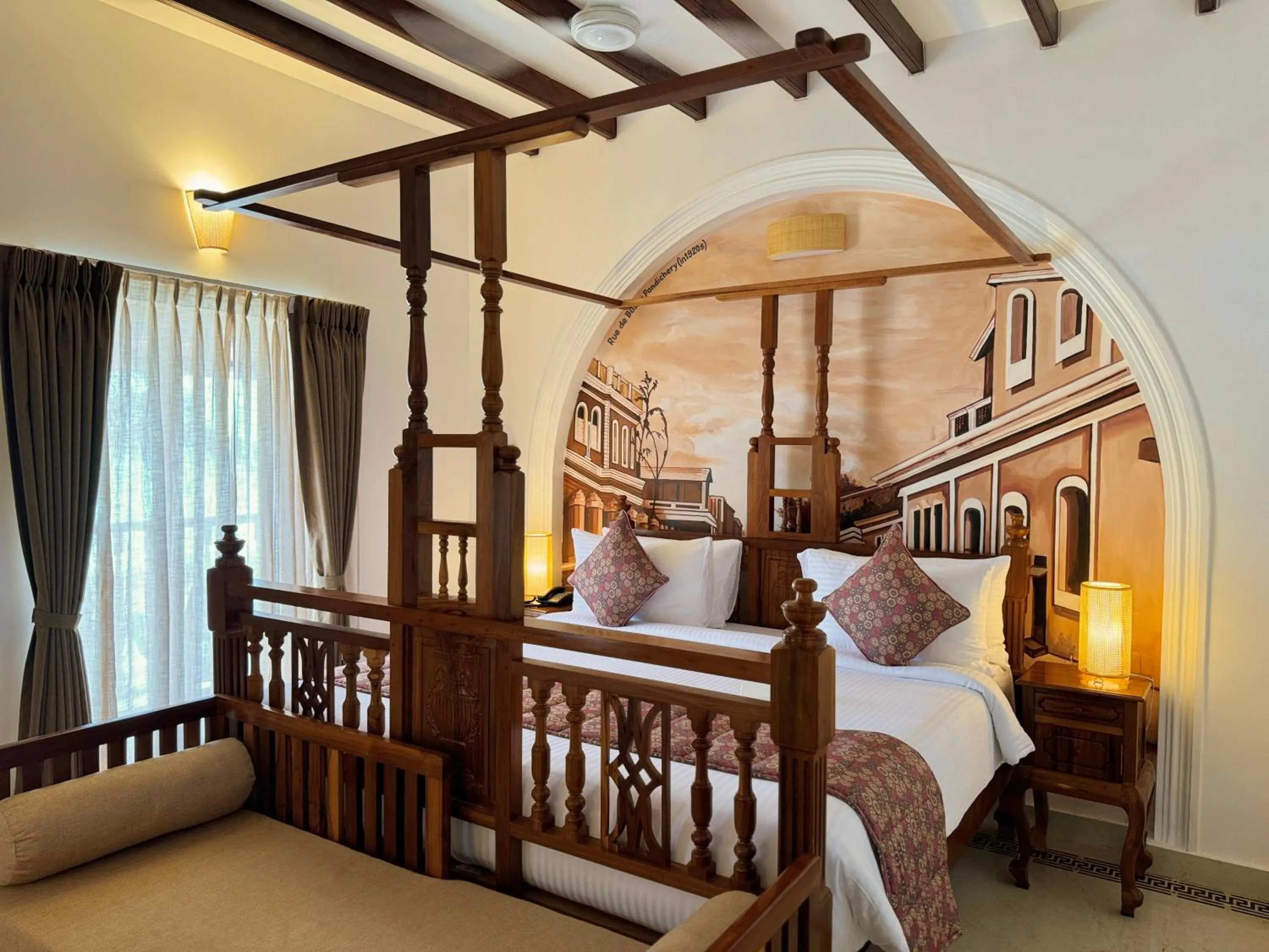 Bed in La Plage Seaview Suites