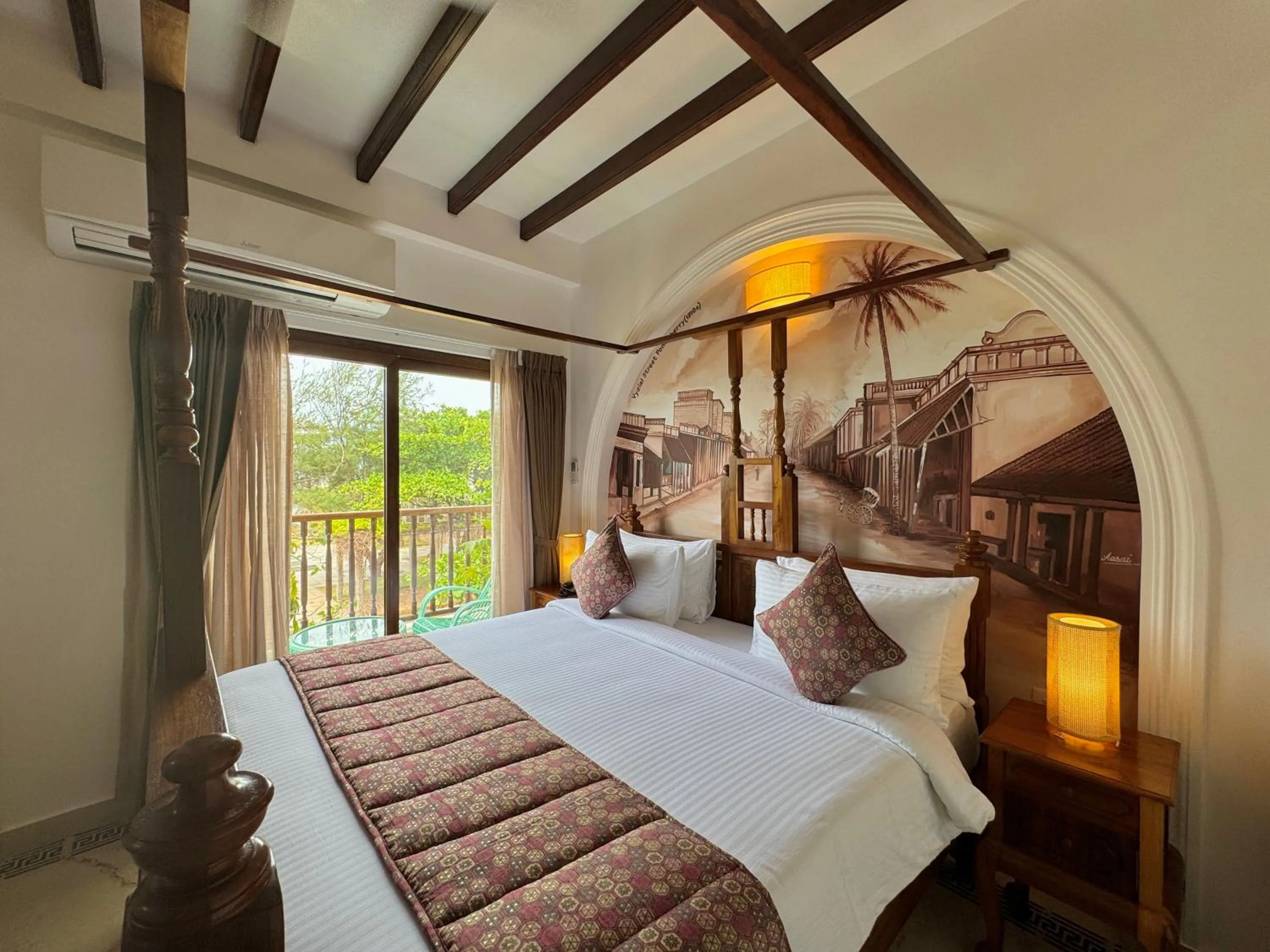 Bed in La Plage Seaview Suites