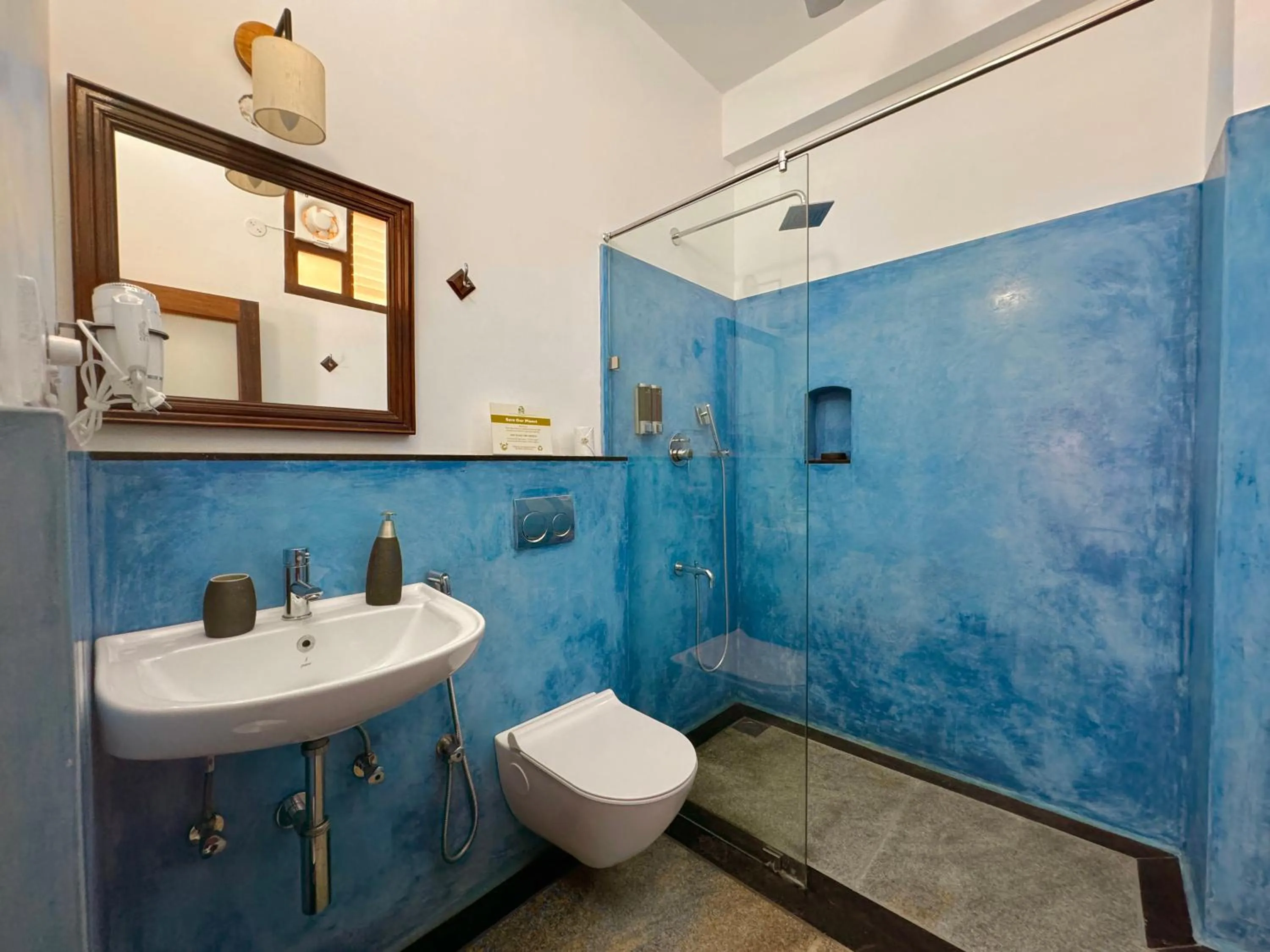 Bed in La Plage Seaview Suites