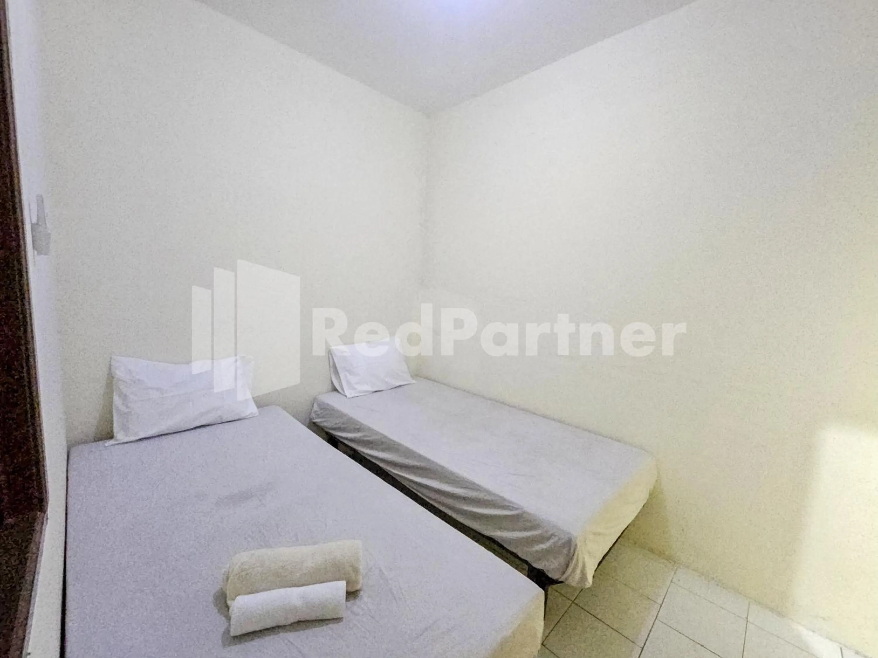 Standard Twin Room in Gedangan Indah Homestay RedPartner