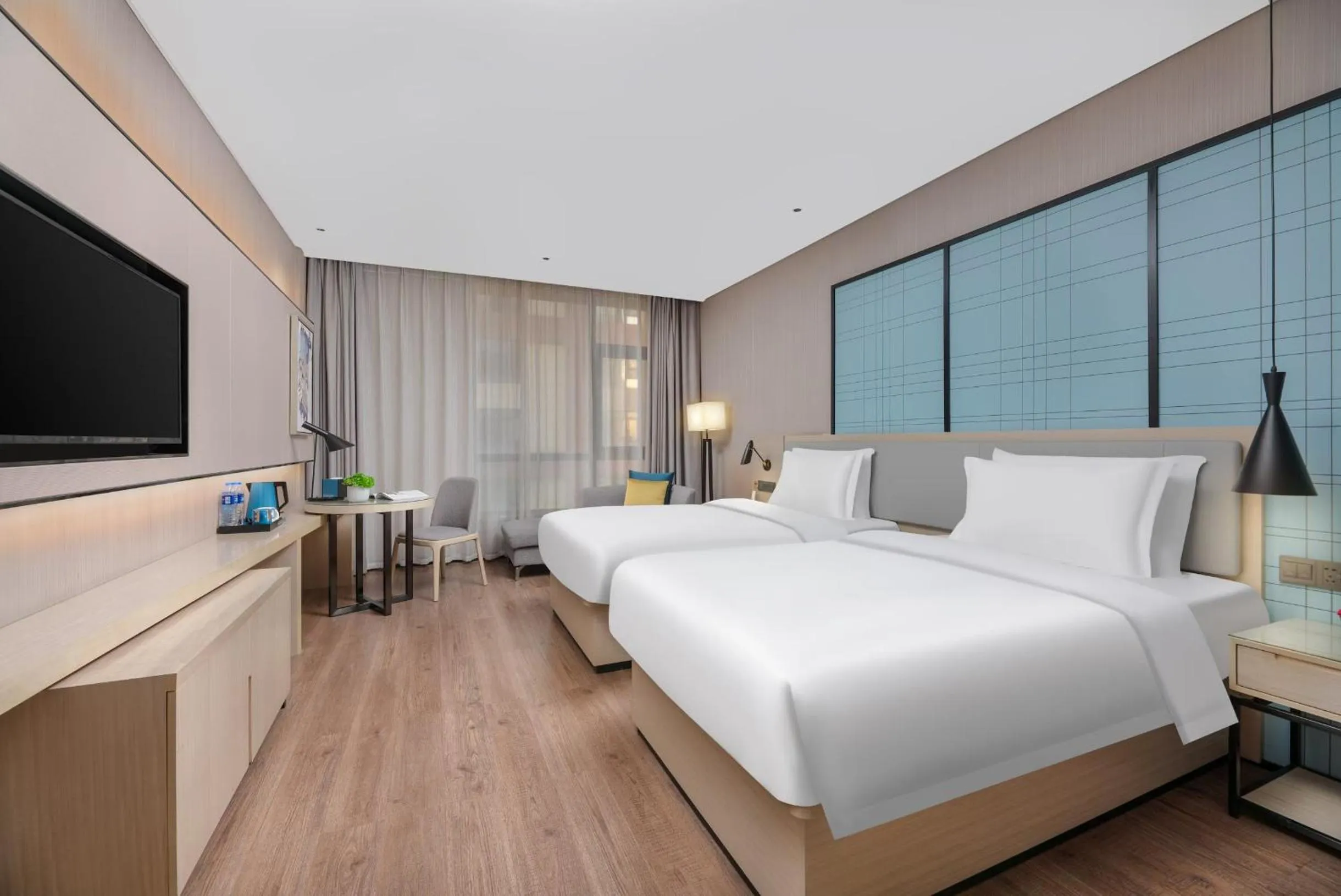 Photo of the whole room, Bed in Echarm Hotel - Xi'an Tai'ao Plaza Baijiakou Metro Station