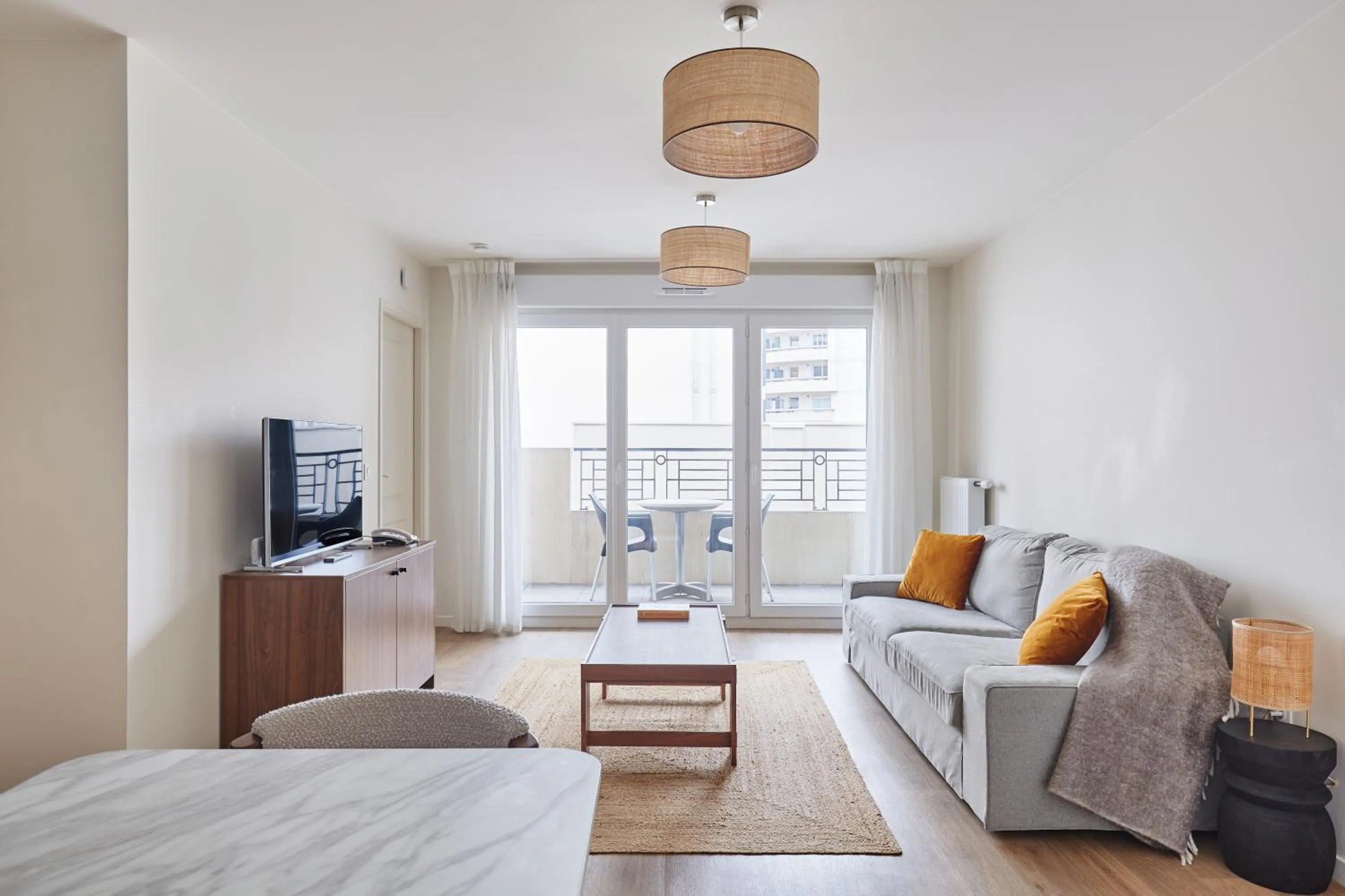 Seating area, Bed in Appart Hotel Paris Levallois Maurice Ravel