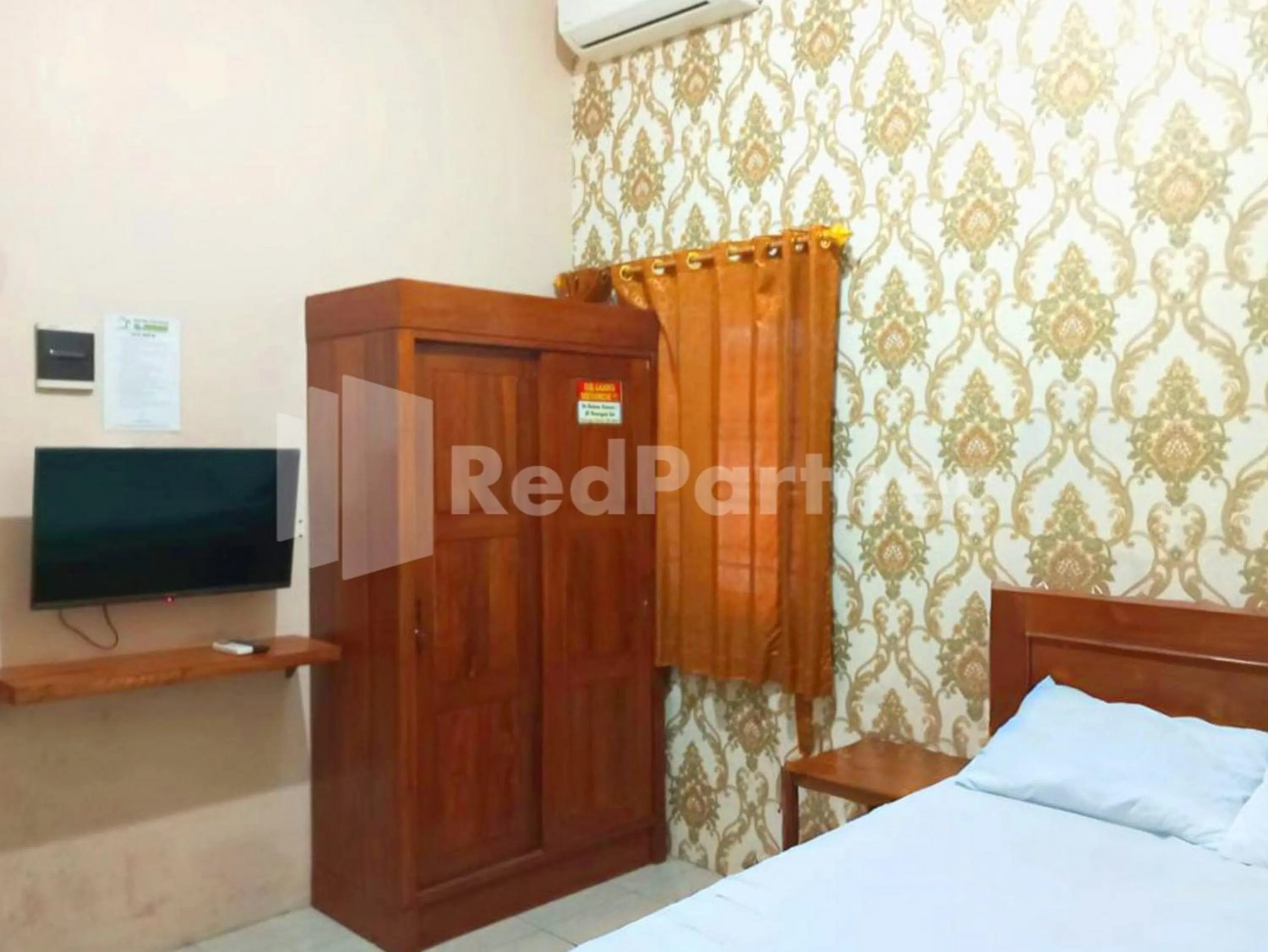 Bedroom, Bed in Isa Homestay Kudus Mitra Reddoorz