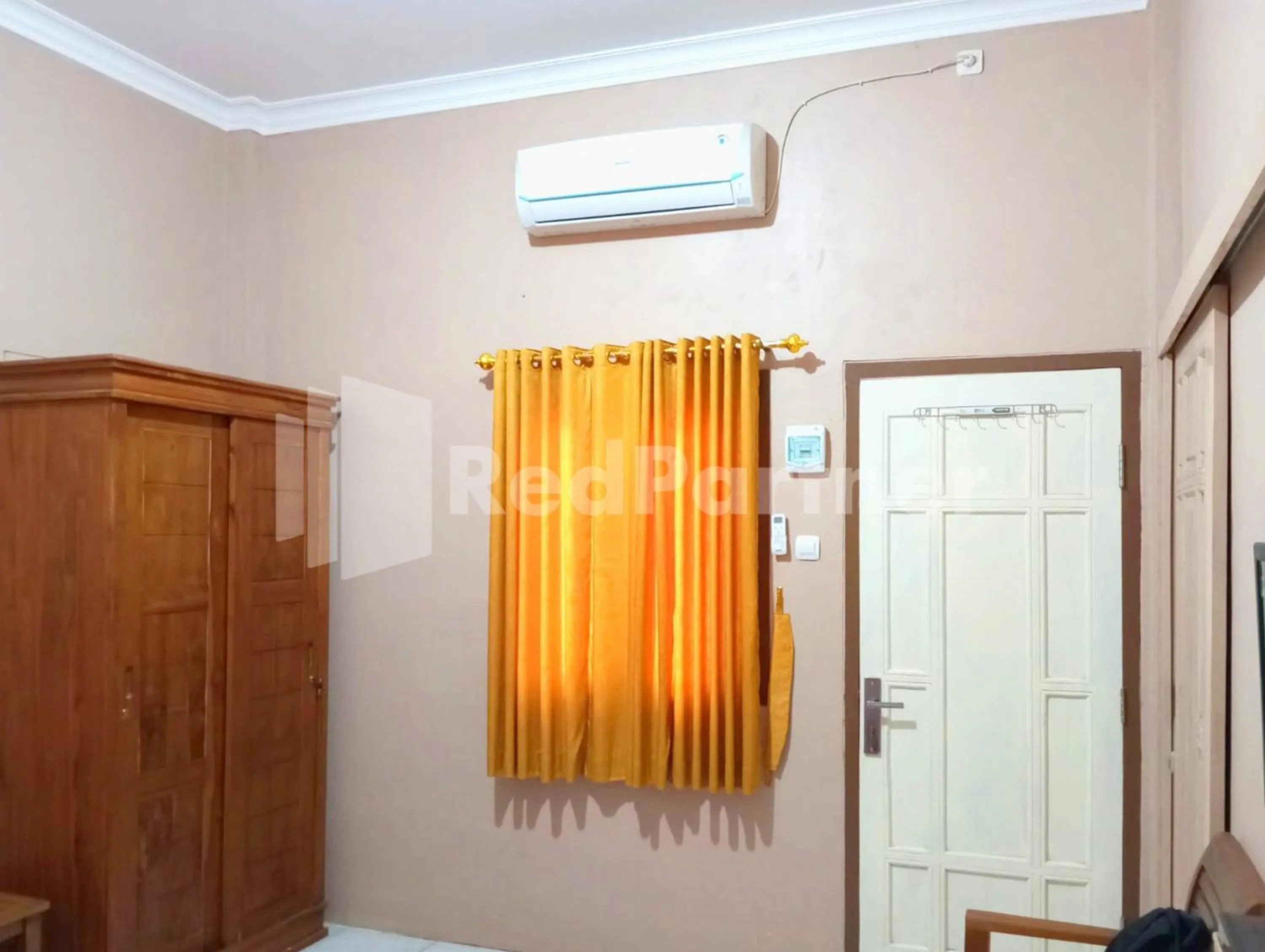 Bedroom in Isa Homestay Kudus Mitra Reddoorz