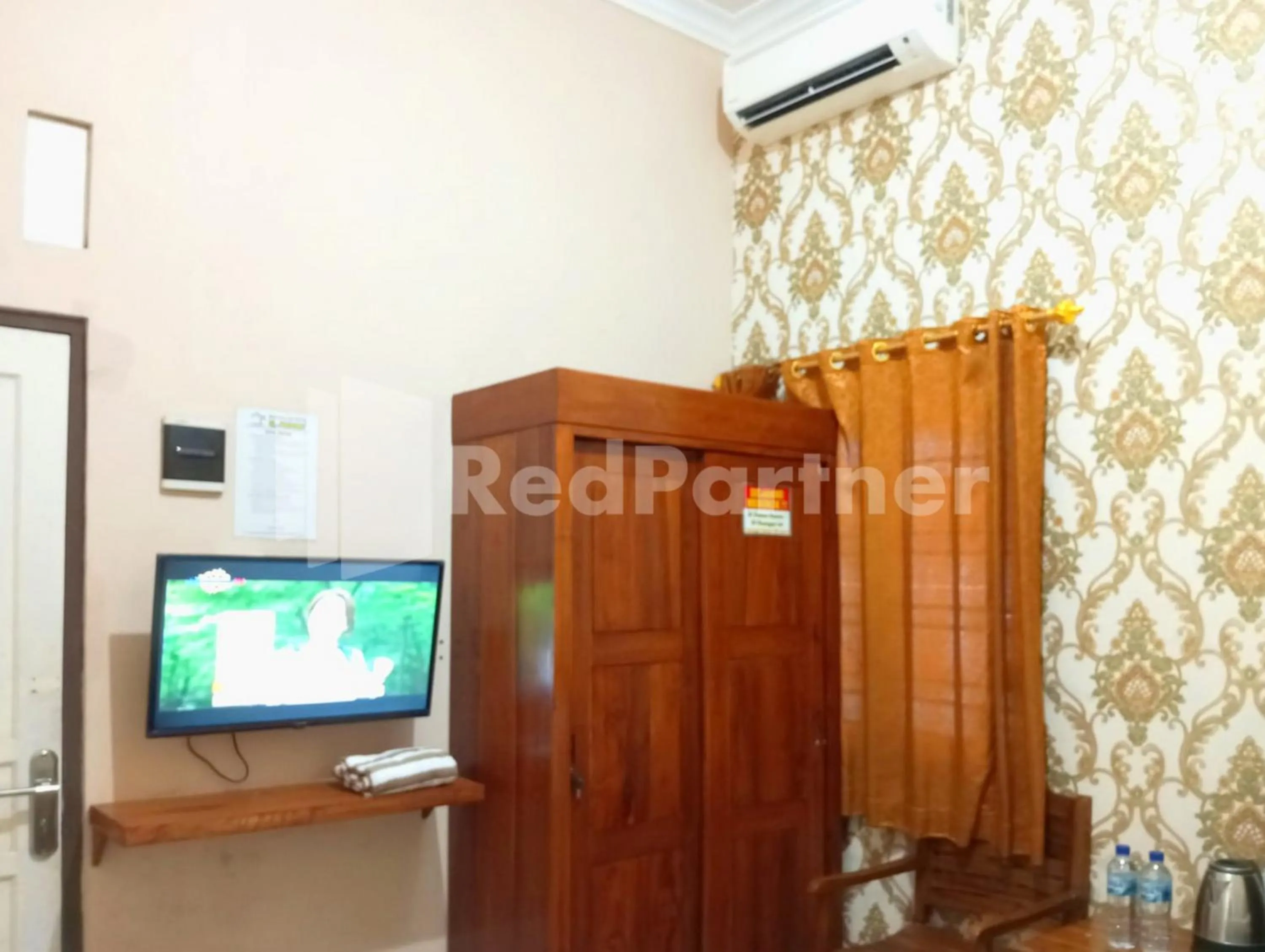 Bedroom in Isa Homestay Kudus Mitra Reddoorz