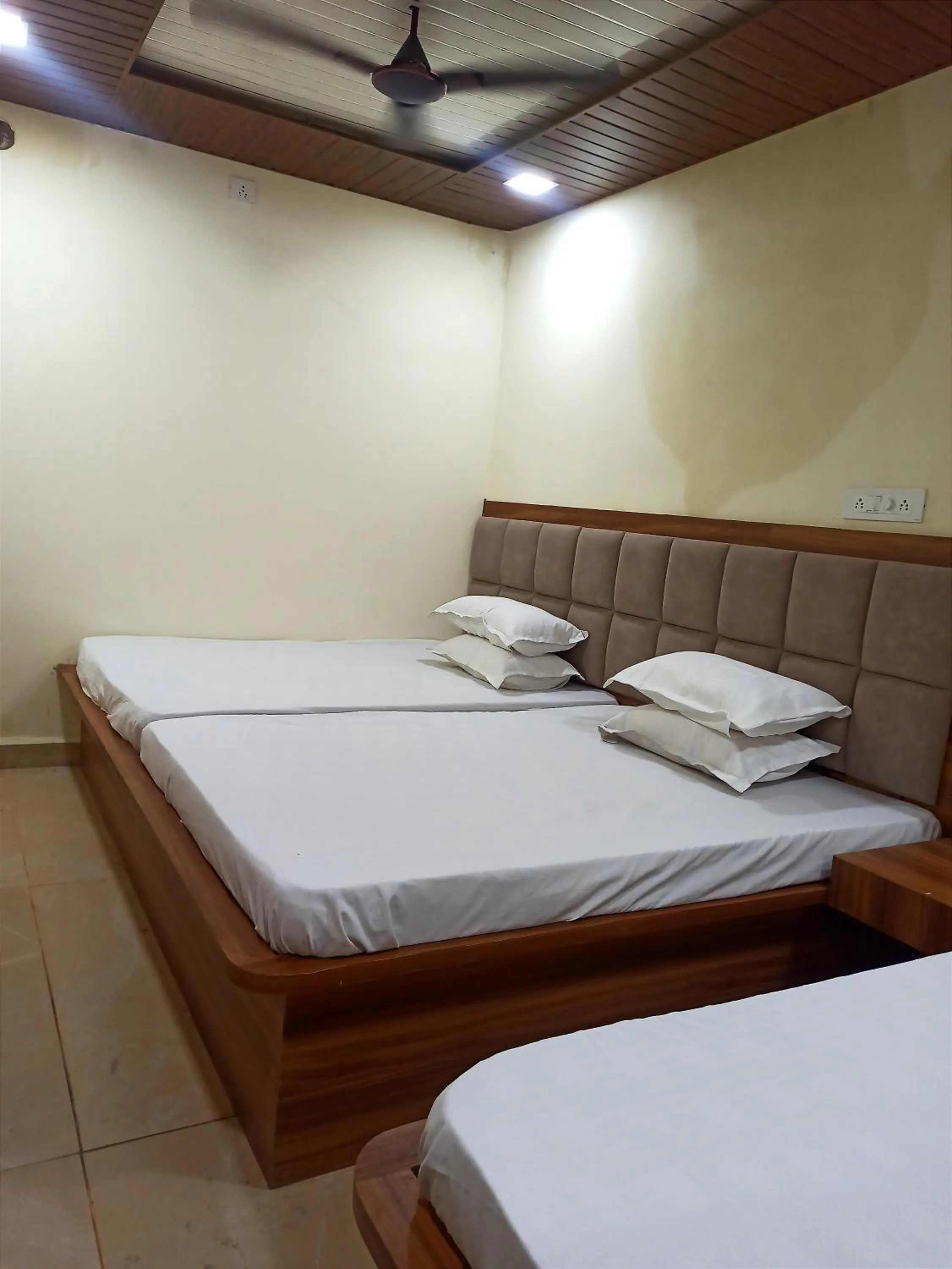 Bed in Hotel Yuvan Palace