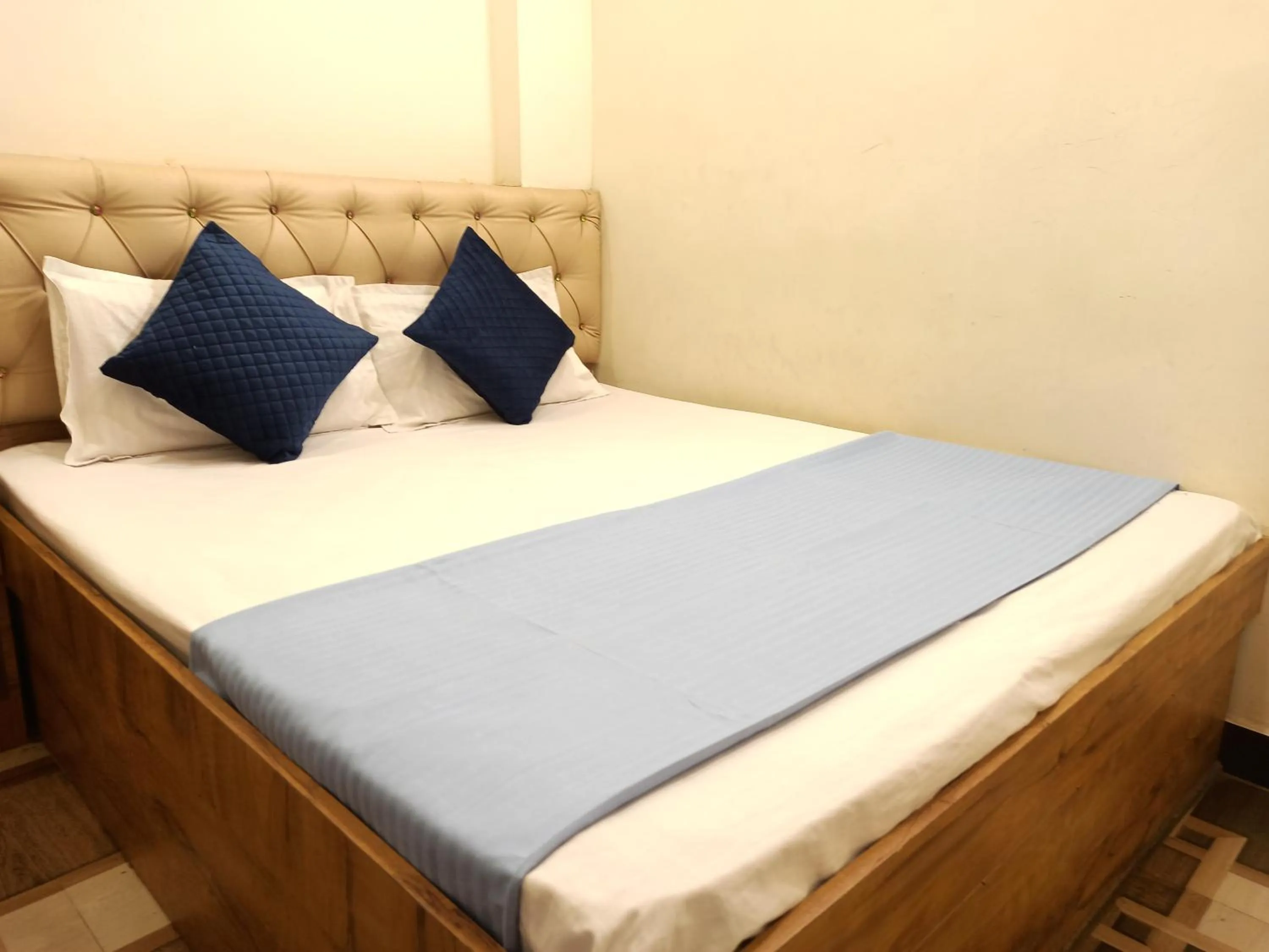 Bed in Hotel Yuvan Palace