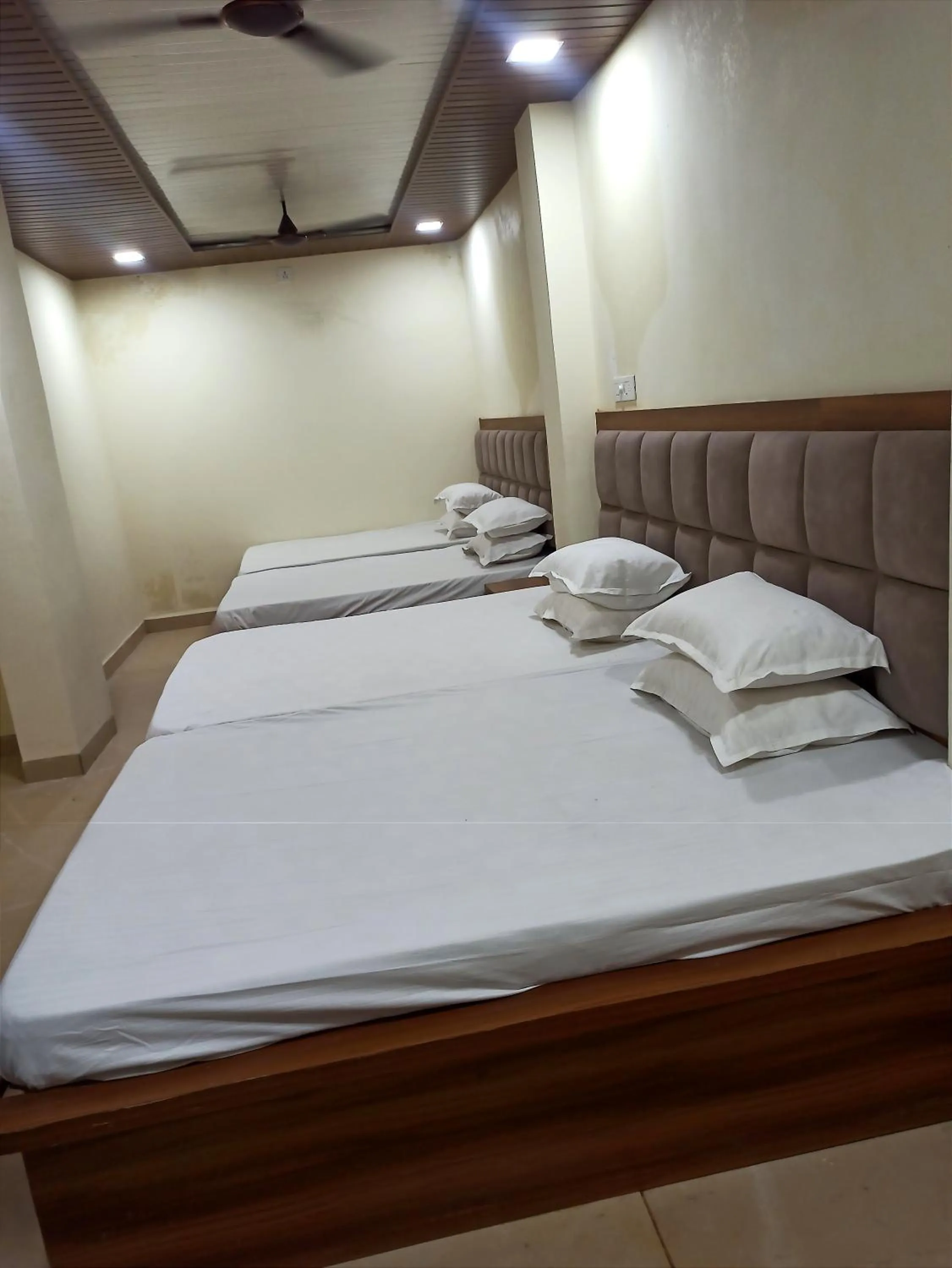 Bed in Hotel Yuvan Palace