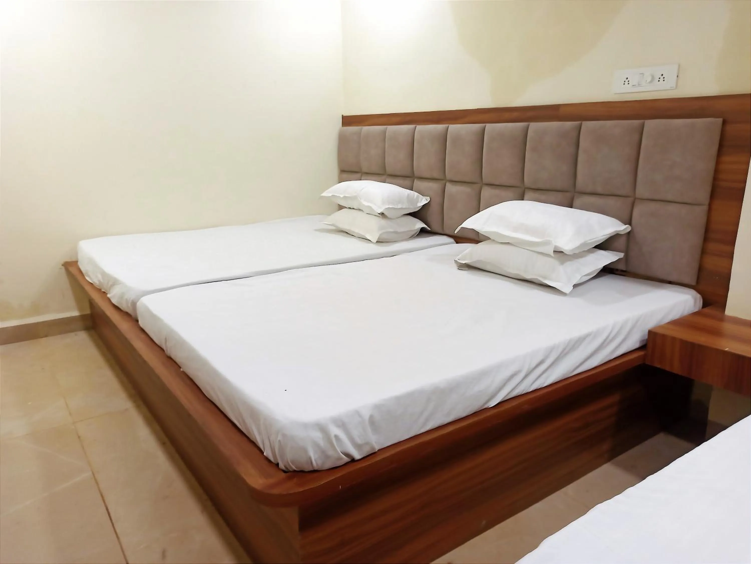 Bed in Hotel Yuvan Palace