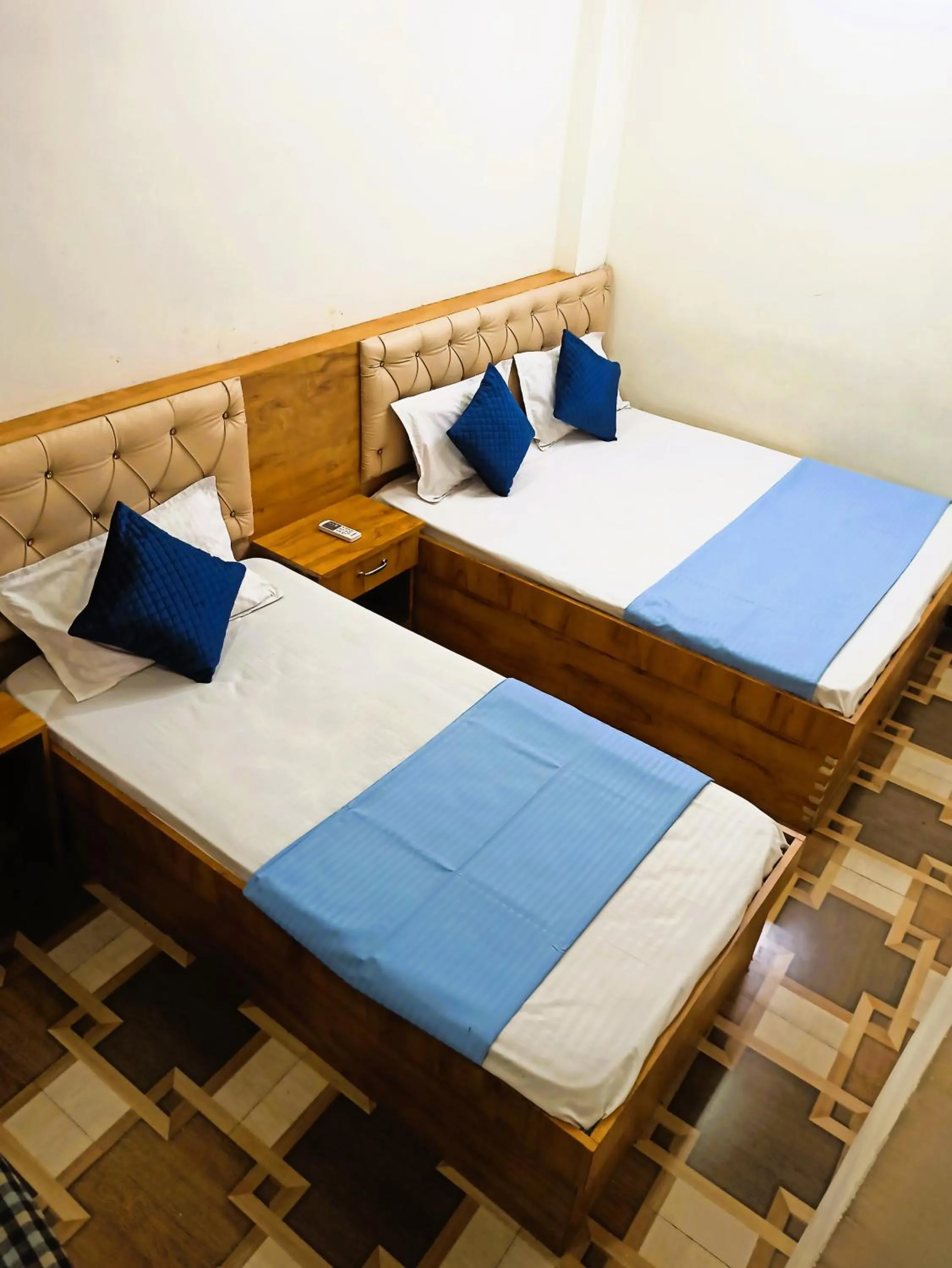 Bed in Hotel Yuvan Palace