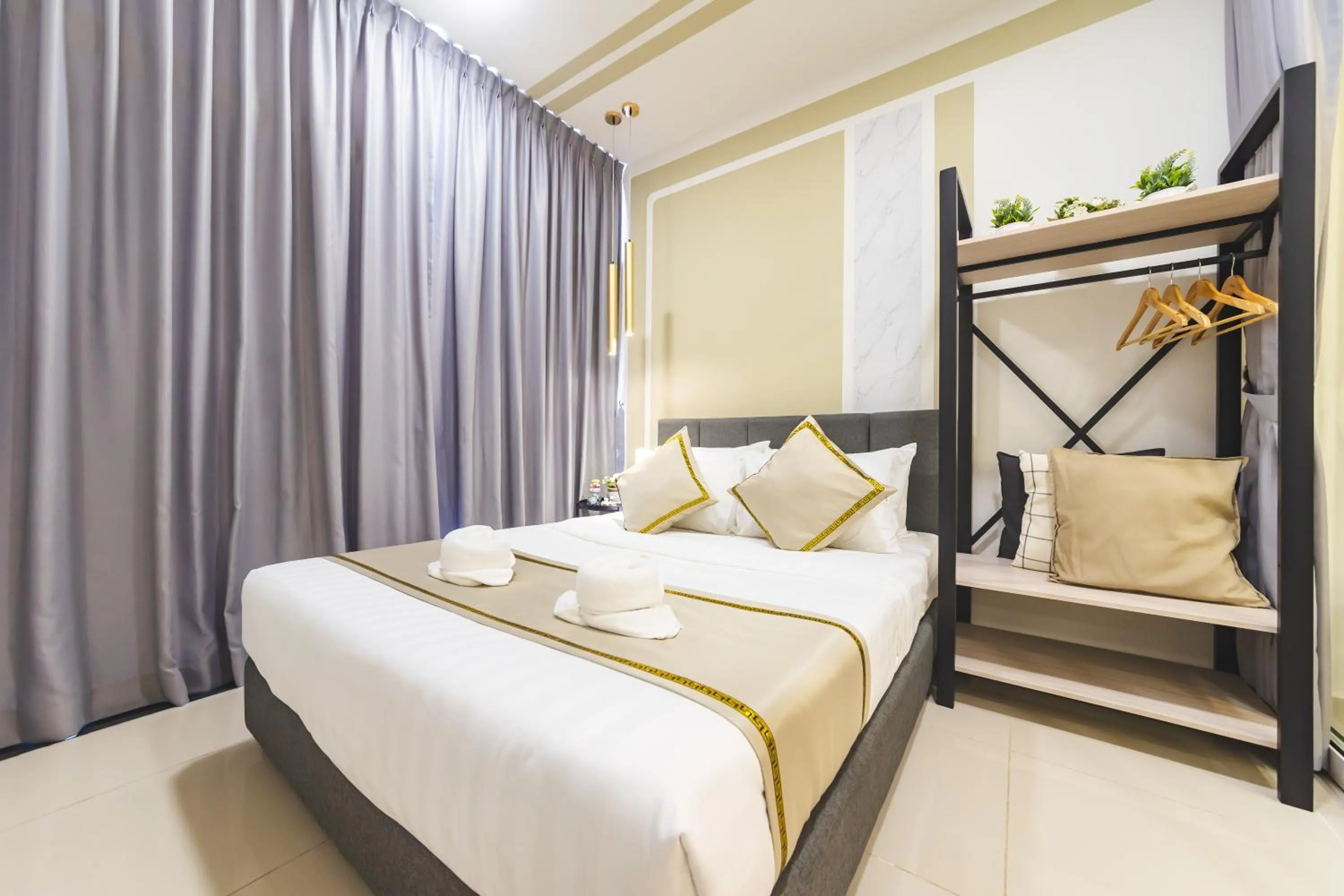 Bed in Beautiful Seaview Suites at The Shore Kota Kinabalu