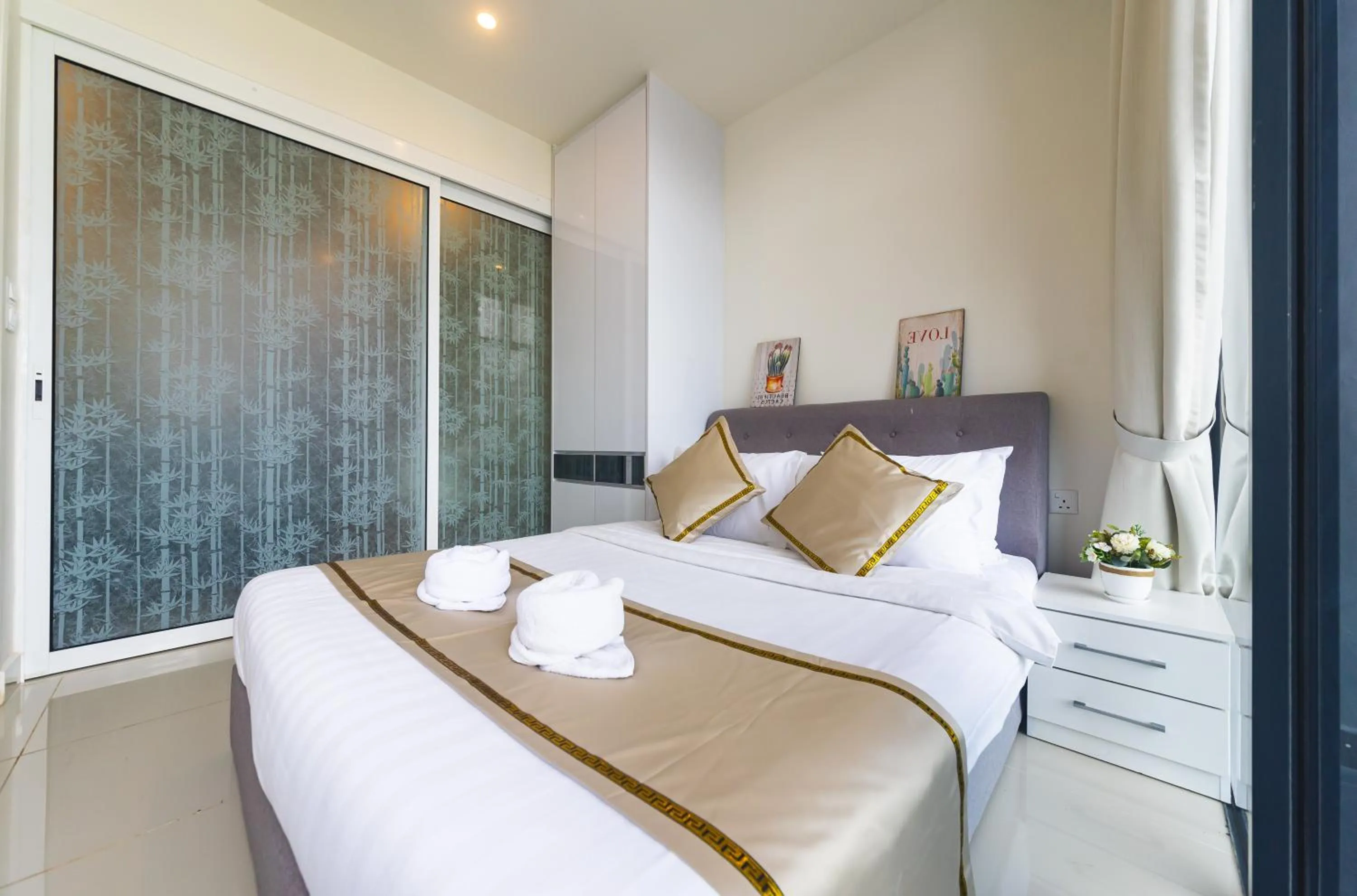 Bed in Beautiful Seaview Suites at The Shore Kota Kinabalu